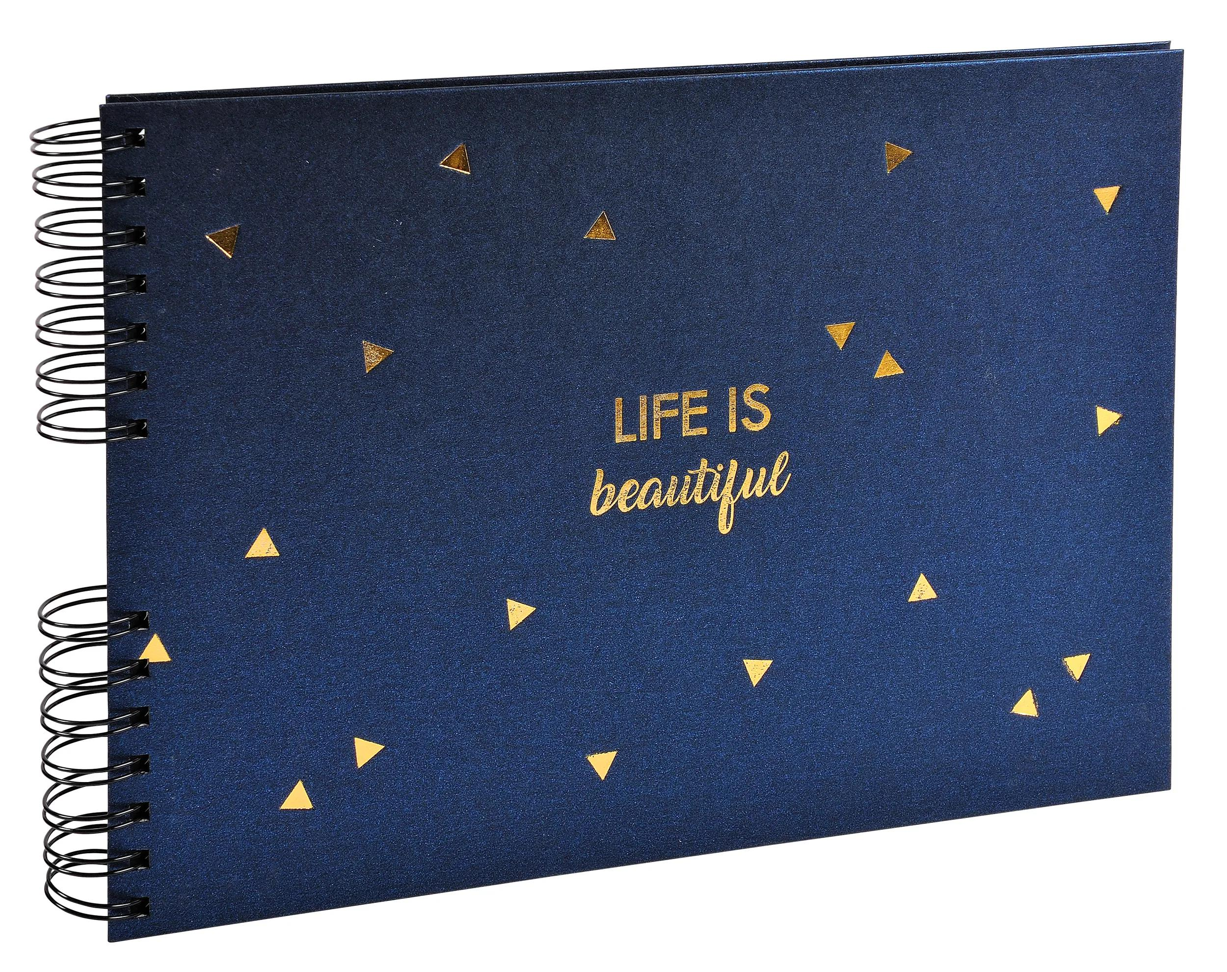 Cuaderno azul oscuro con triángulos dorados y texto "Life is beautiful".