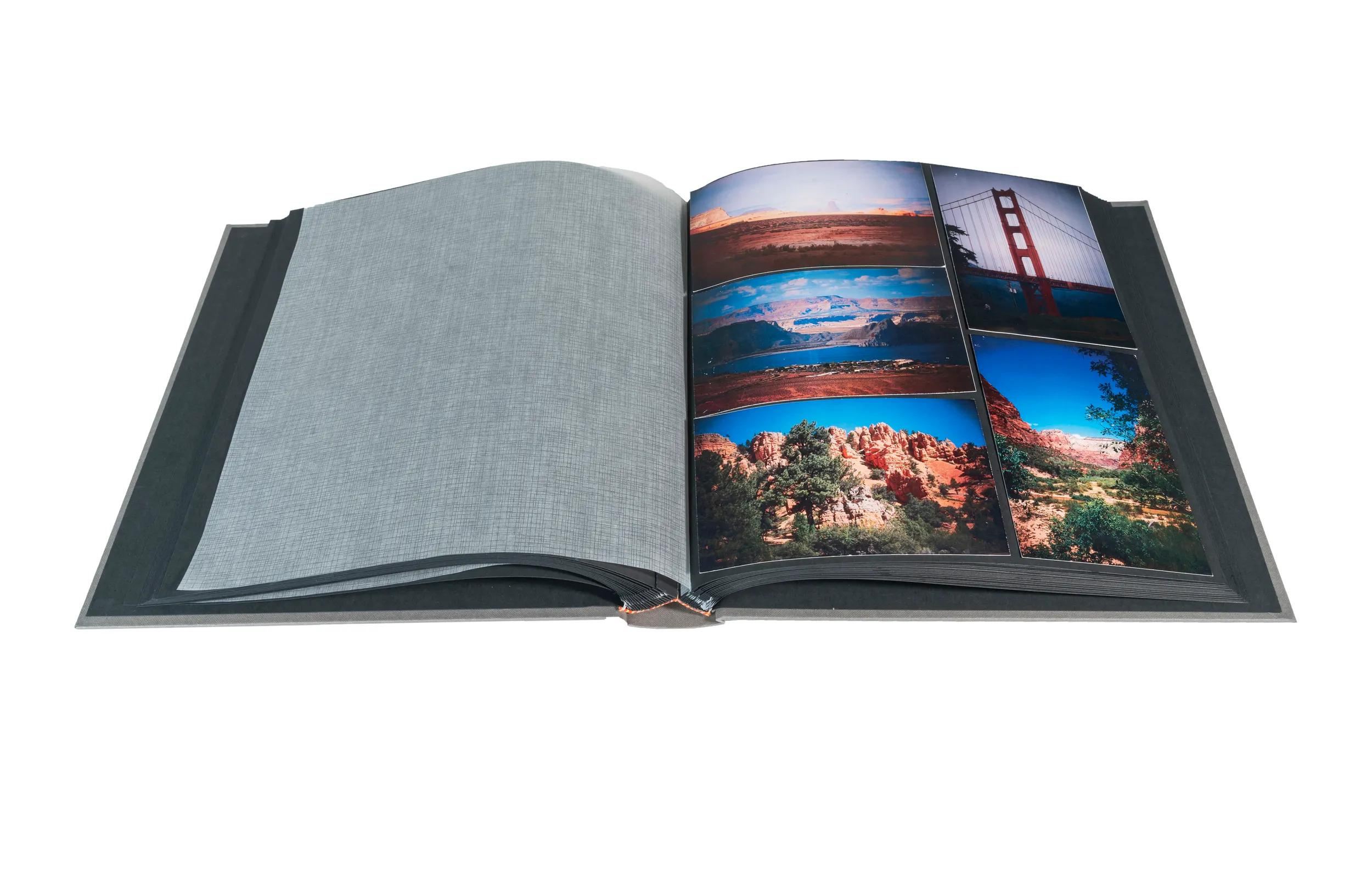 Un álbum de fotos abierto que muestra imágenes de paisajes, incluido el Golden Gate.