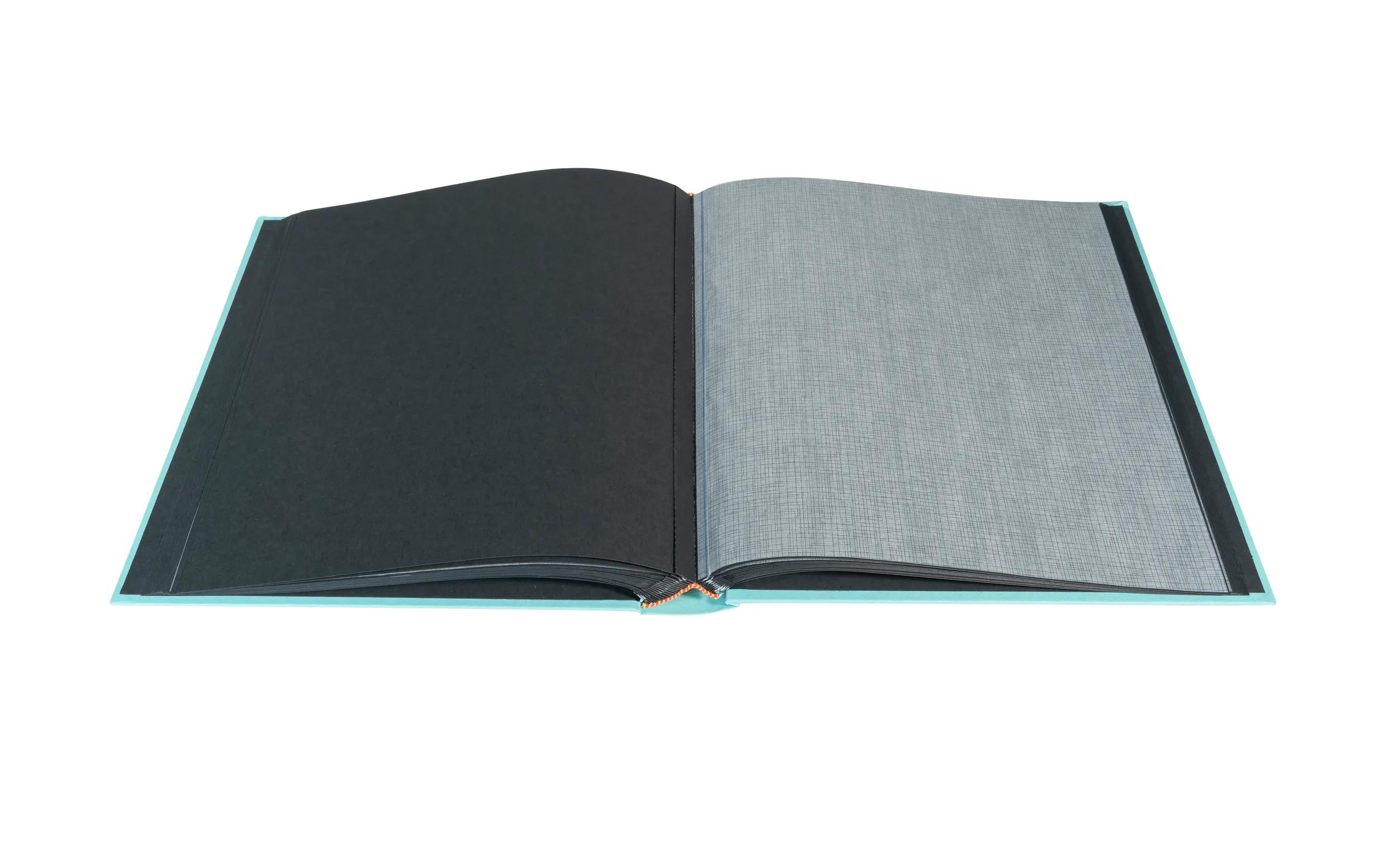 Un libro abierto que muestra una página negra y una página gris claro.