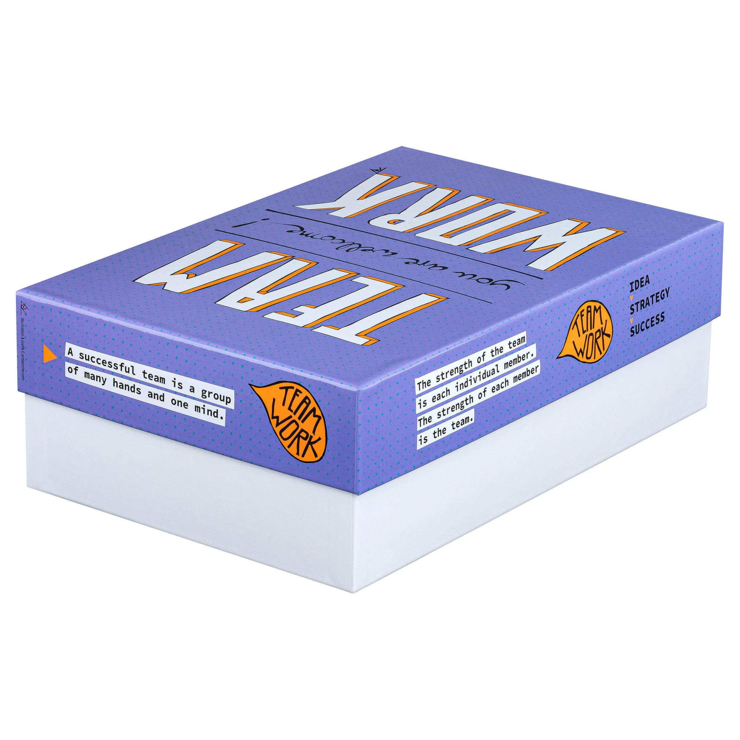 Caja morada con texto 'TEAM WORK', 'IDEA', 'STRATEGY', 'SUCCESS'.