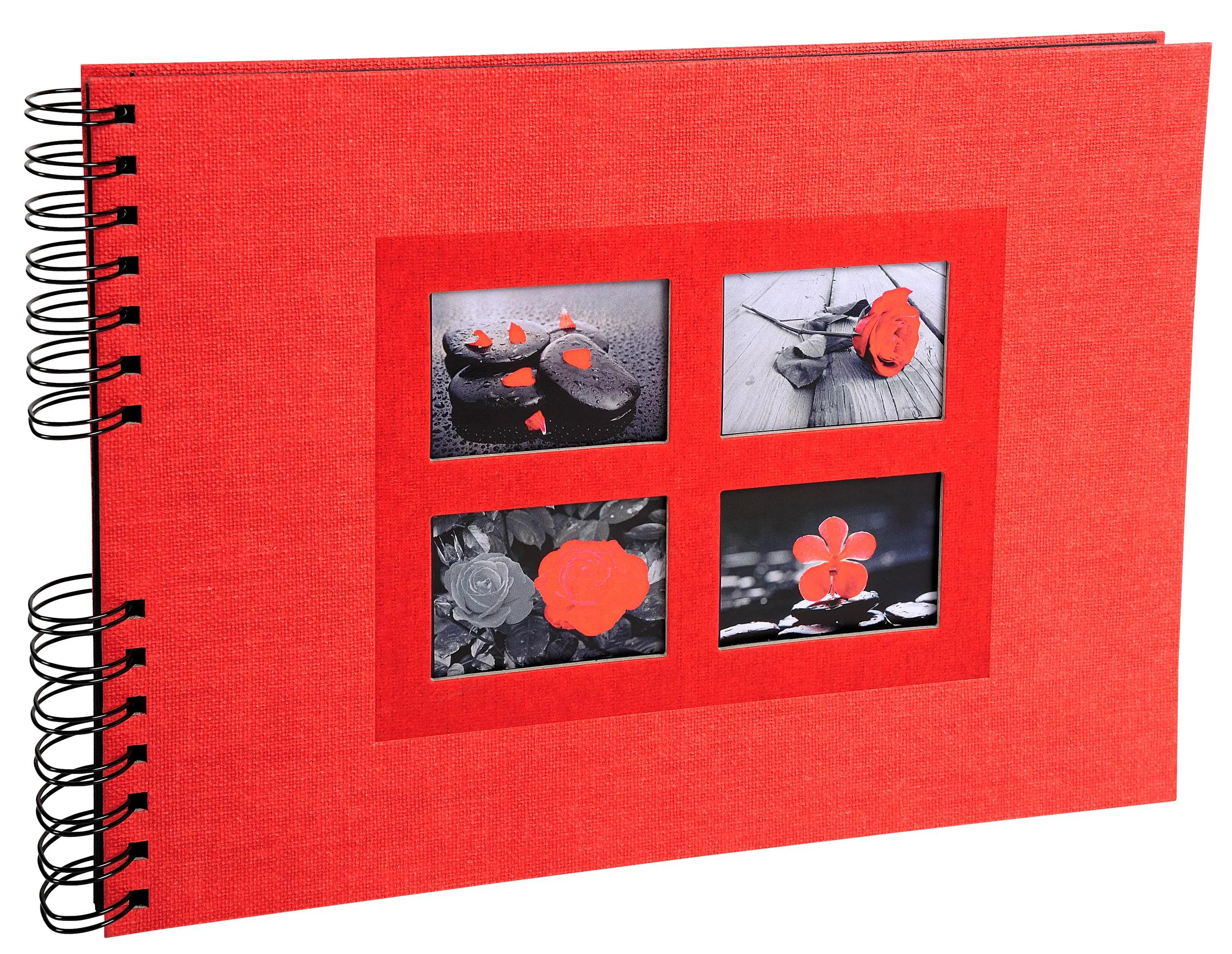 Álbum de fotos rojo con espiral y cuatro recortes: rosas y piedras.