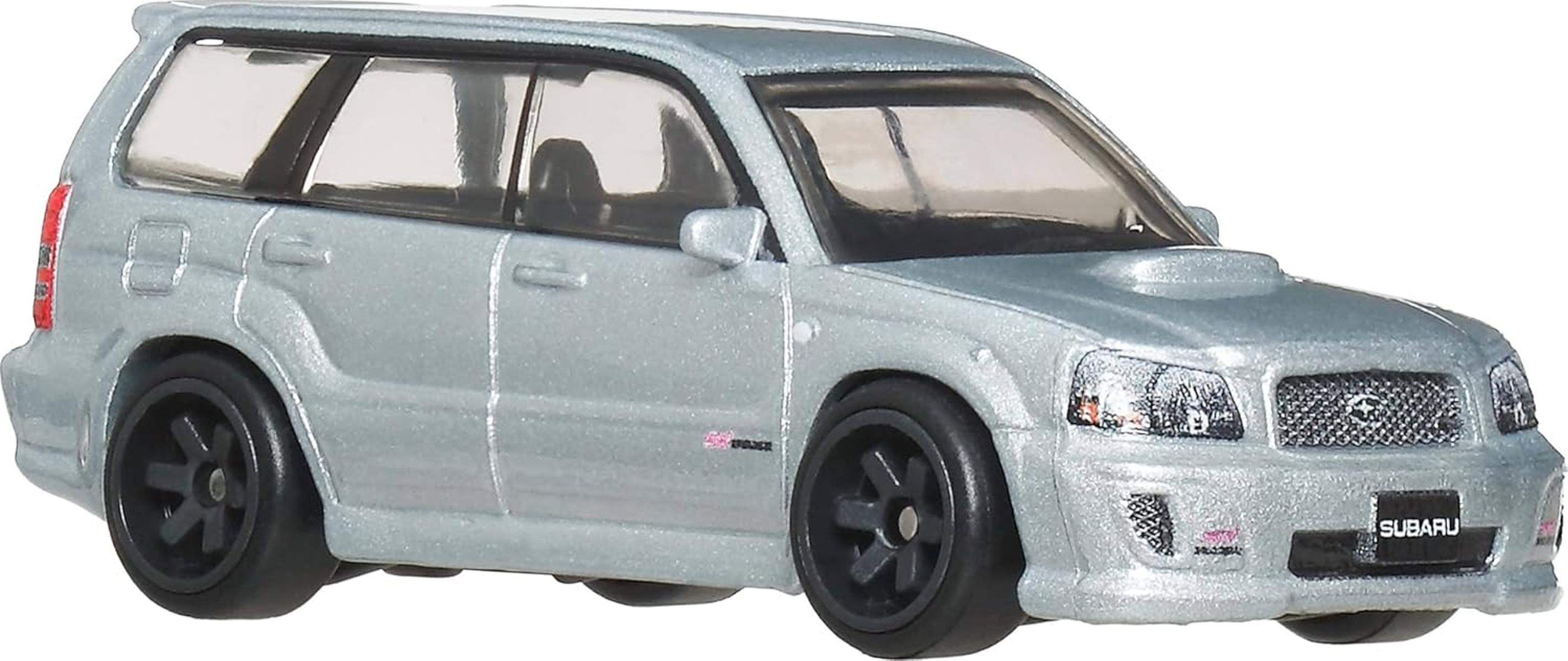 Coche de juguete Subaru Forester plateado con llantas negras y ventanas tintadas.