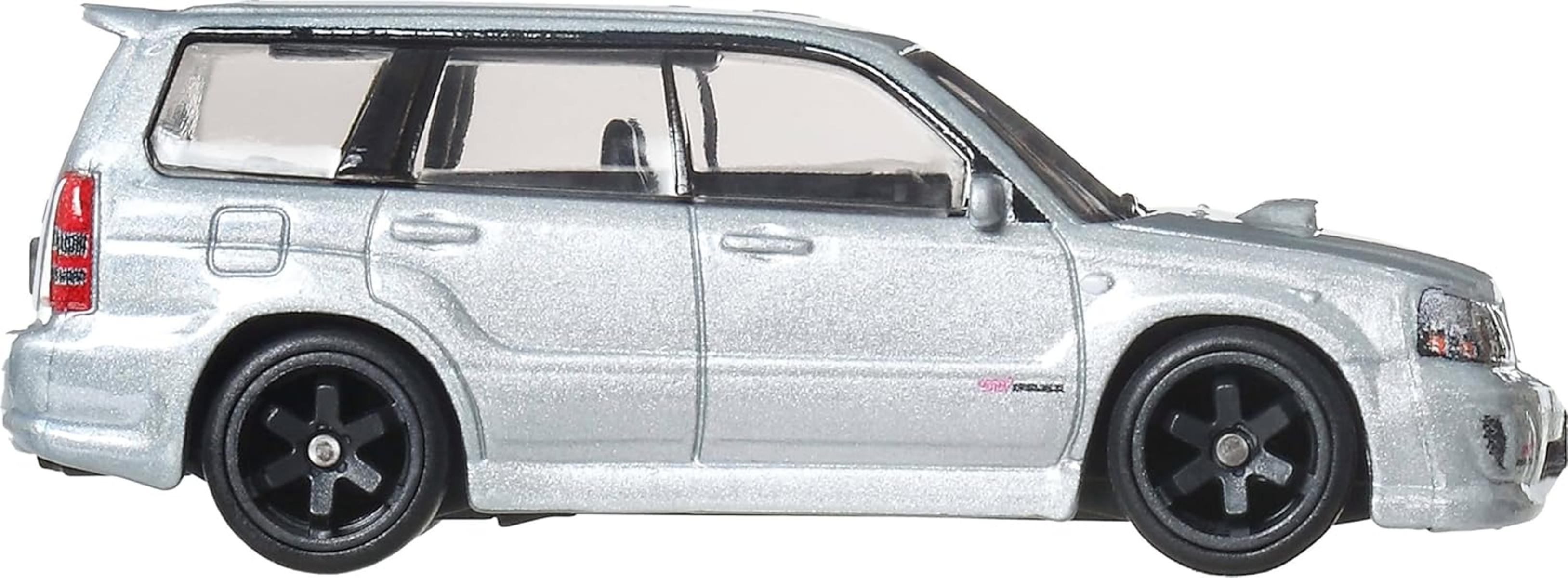 Coche de juguete plateado con ruedas negras, vista lateral.