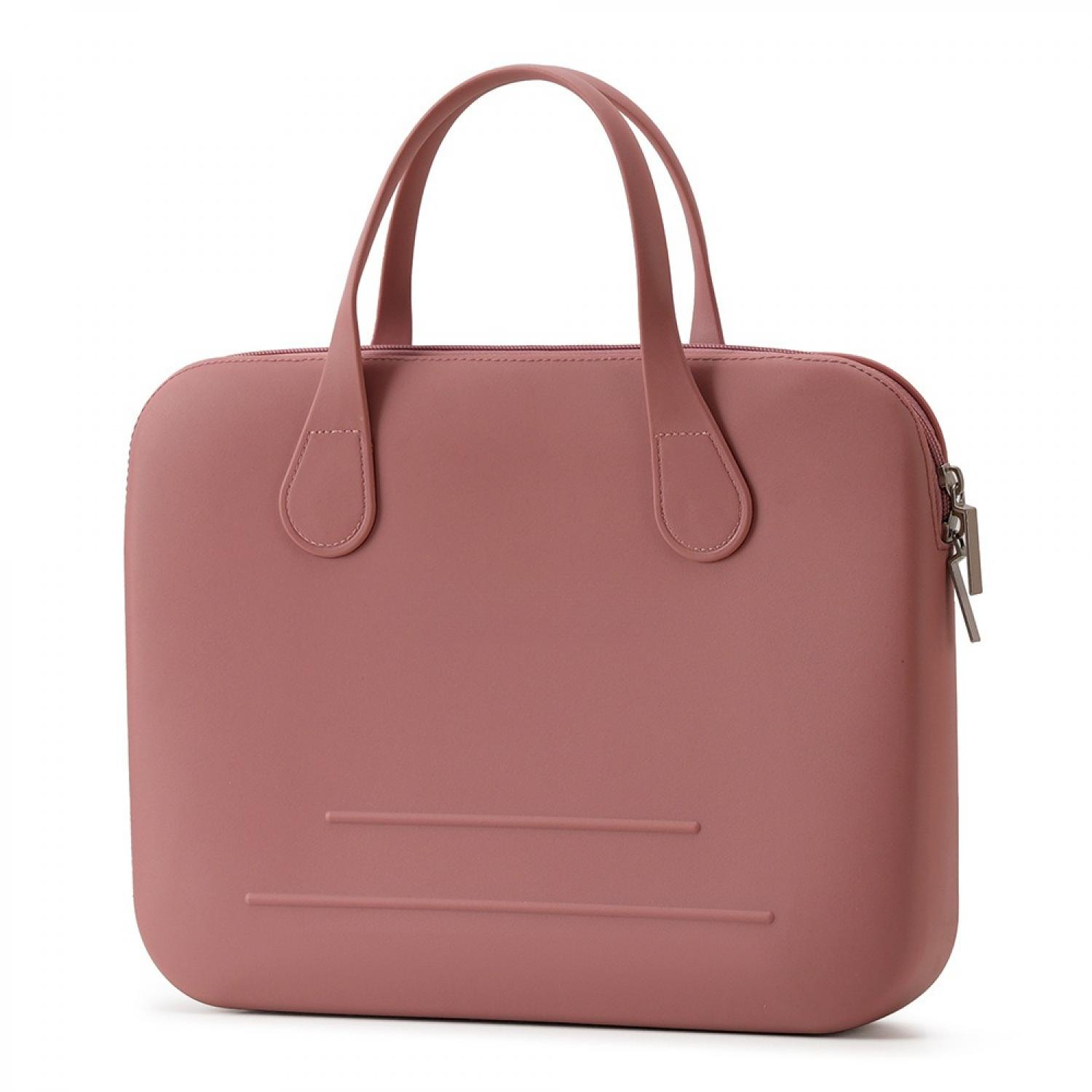 Eine staubige rosafarbene Tasche mit zwei Henkeln und einem Reißverschluss.
