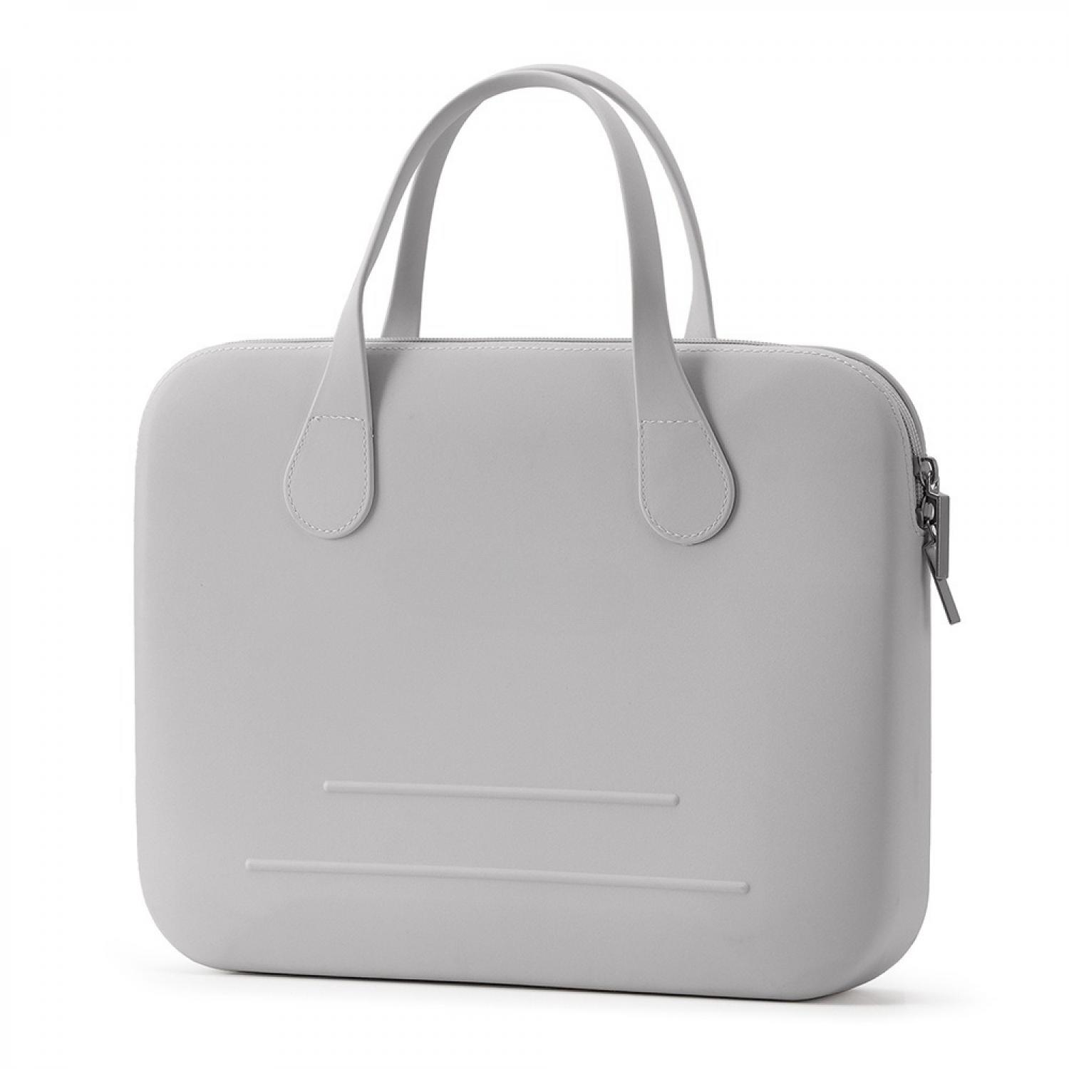 Eine graue Laptoptasche mit zwei Henkeln und einem Reißverschluss.
