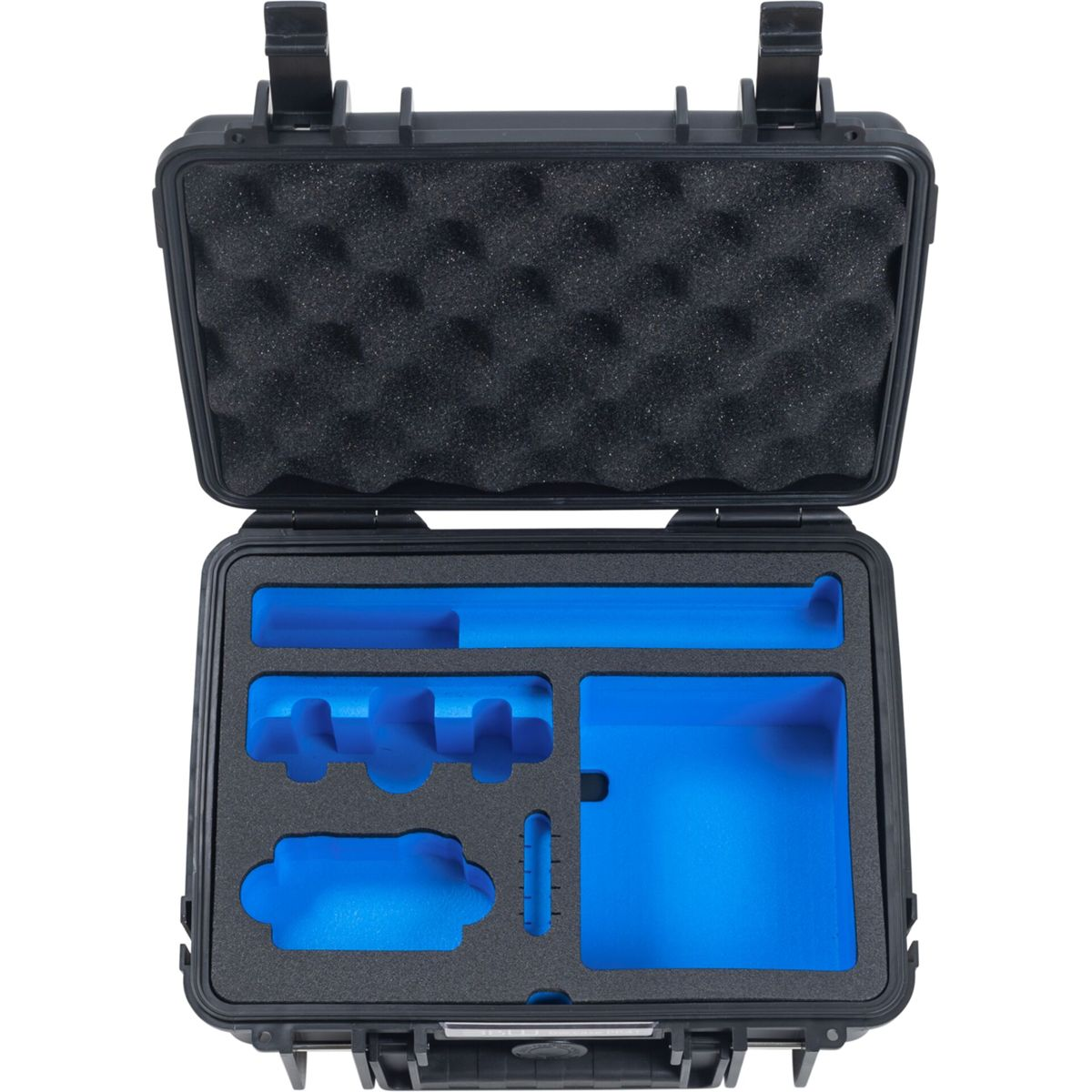 Ein offener schwarzer Koffer mit blauem Schaumstoff-Inlay und Fächern.