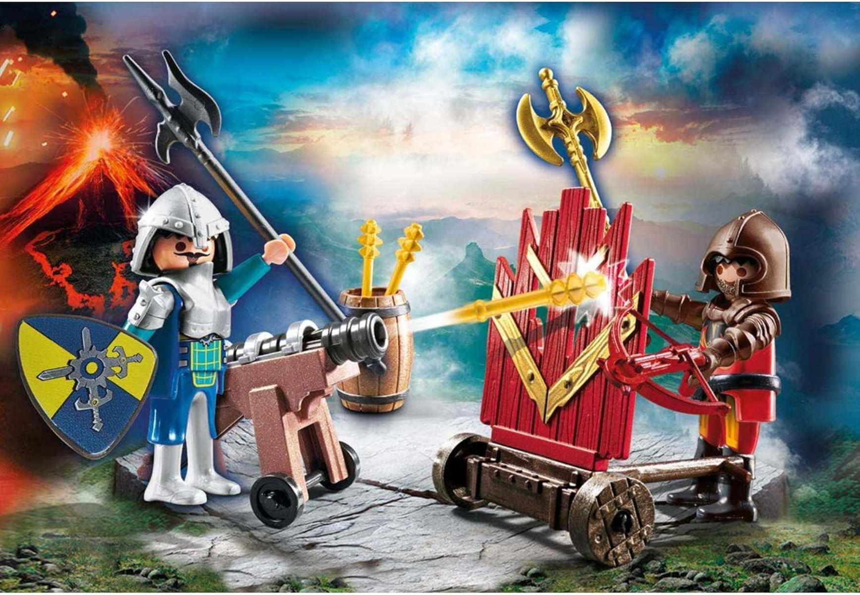 Rycerze Playmobil walczą z armatą i katapultą na tle wulkanu.