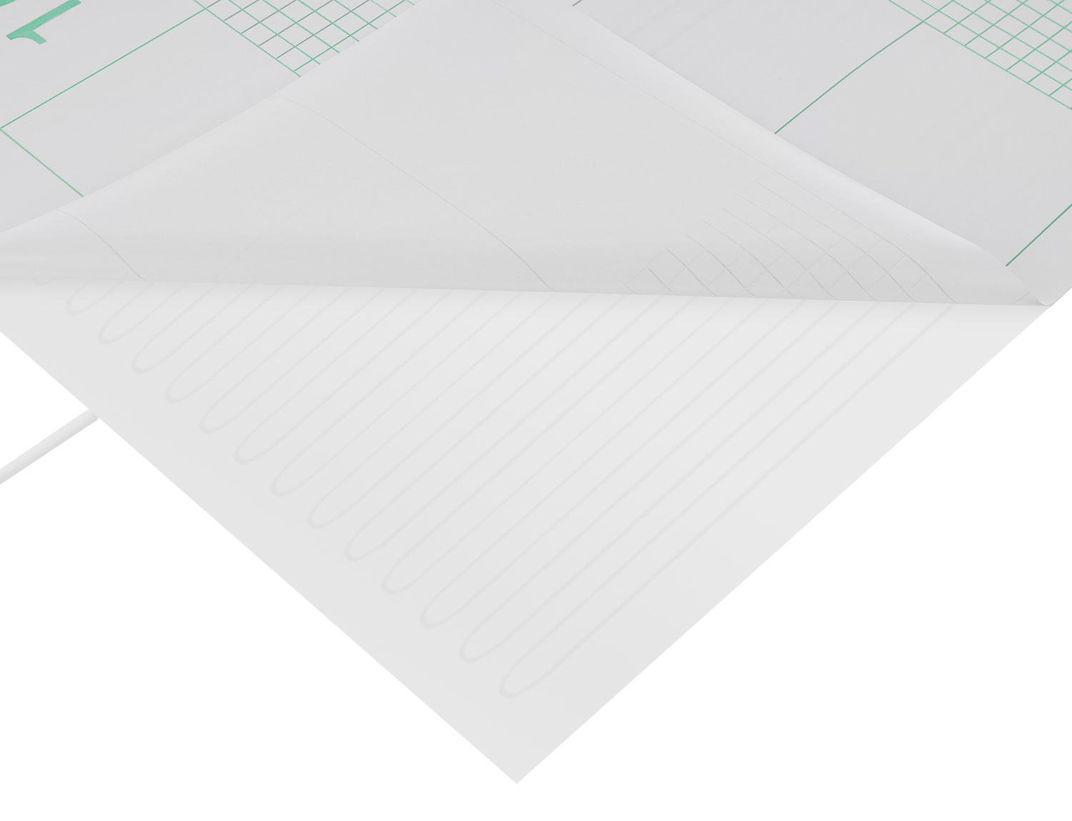 Biała mata grzewcza z widocznymi przewodami grzejnymi i wzorem kratki na papierze.