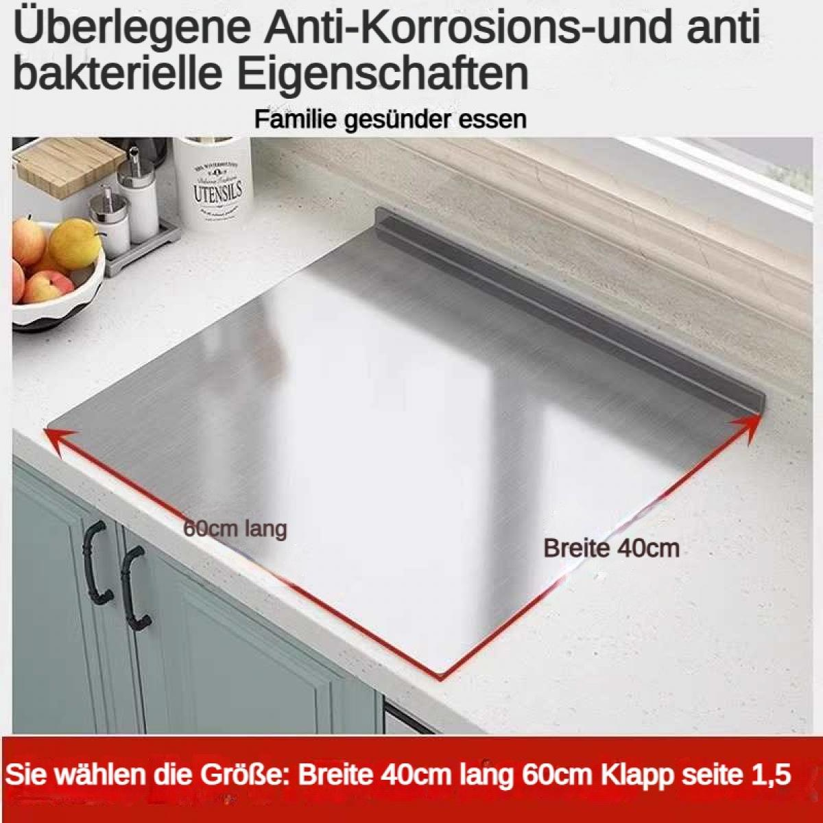 Edelstahl-Abdeckung 60x40cm auf Küchenarbeitsplatte mit Obst und Utensilien.