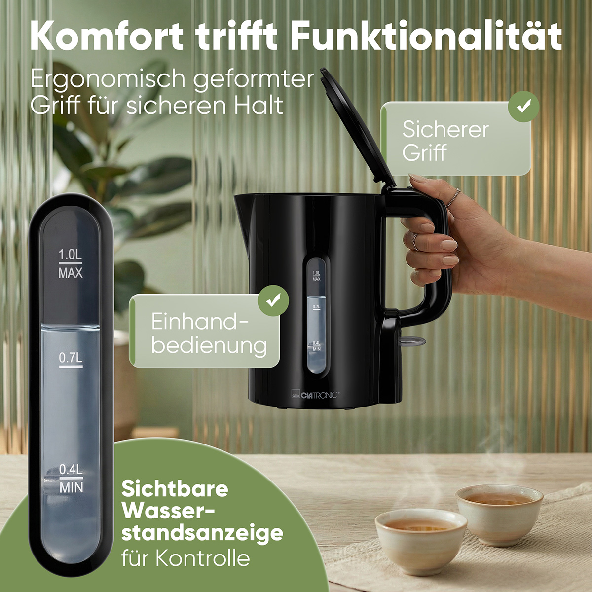 Bollitore nero con indicatore livello acqua visibile e manico.