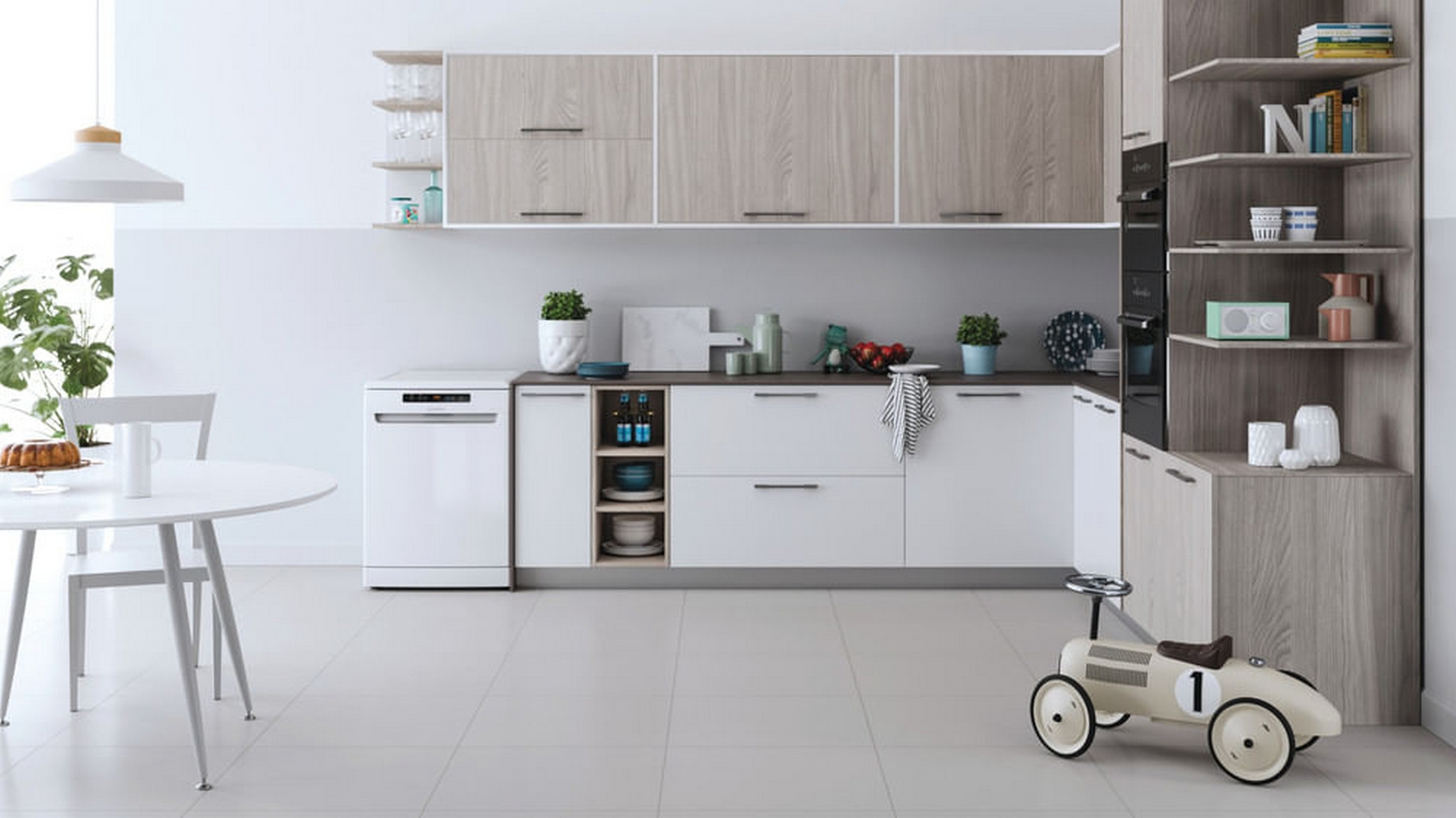 Cucina moderna con elementi in legno, tavolo bianco e macchinina giocattolo.