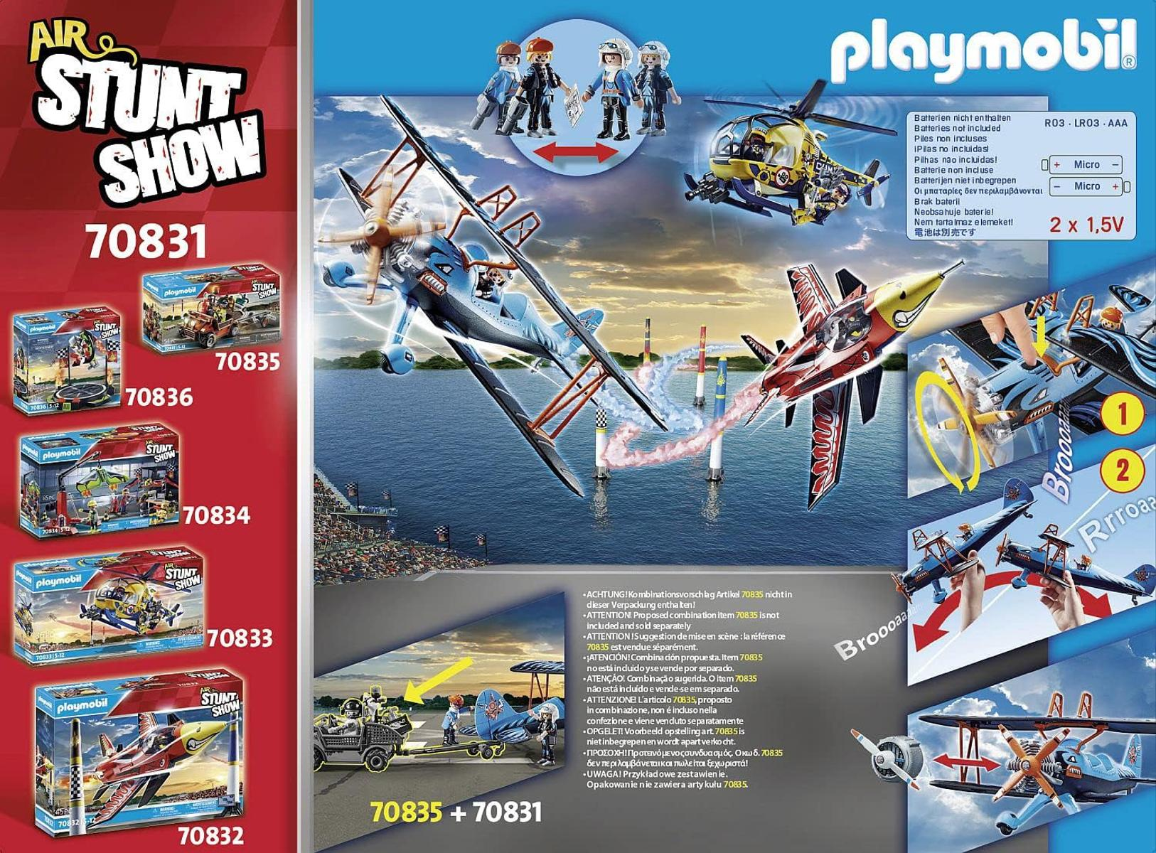Embalaje Playmobil Stunt Show con aviones, helicóptero, figuras y accesorios.