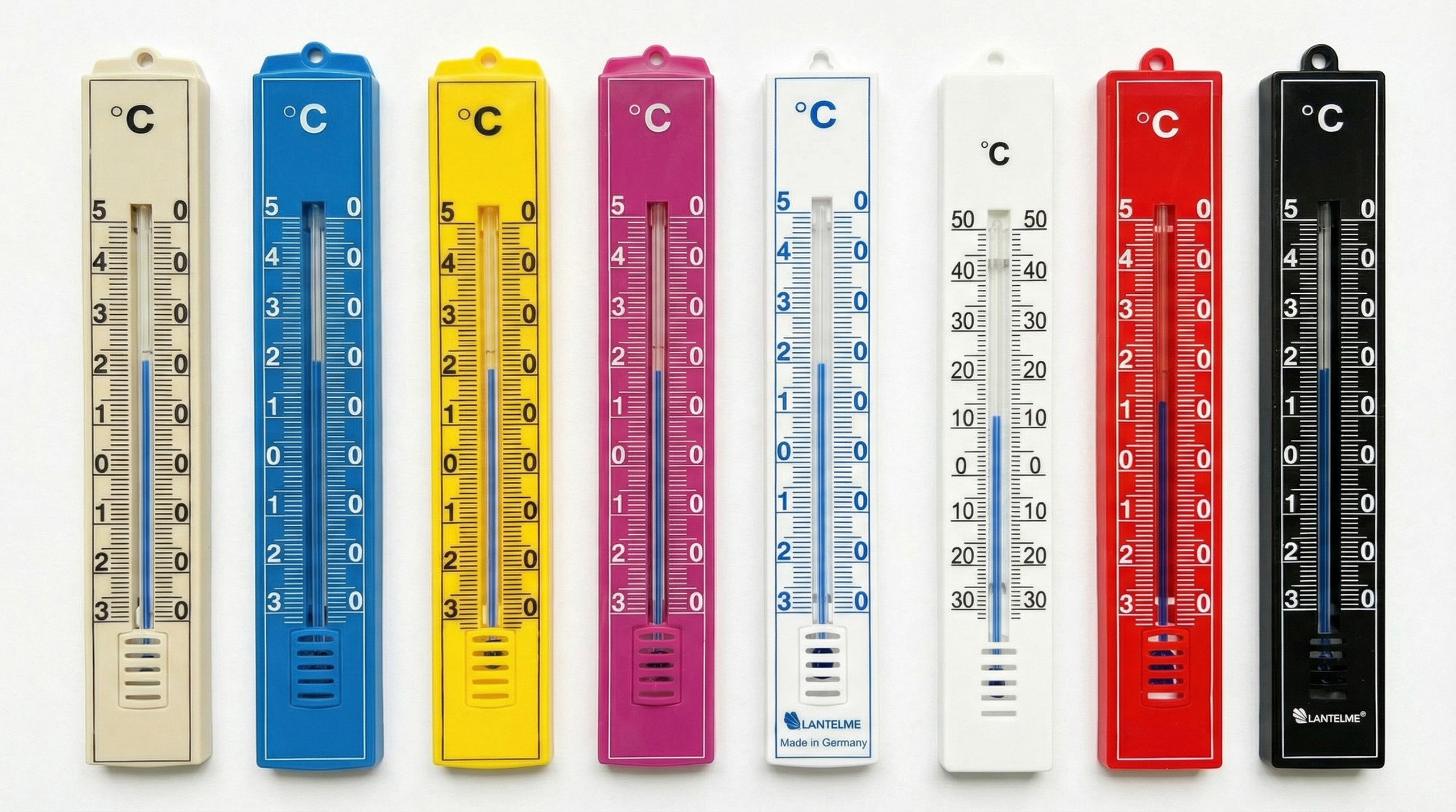 A row of seven colorful thermometers, each showing a different temperature reading.