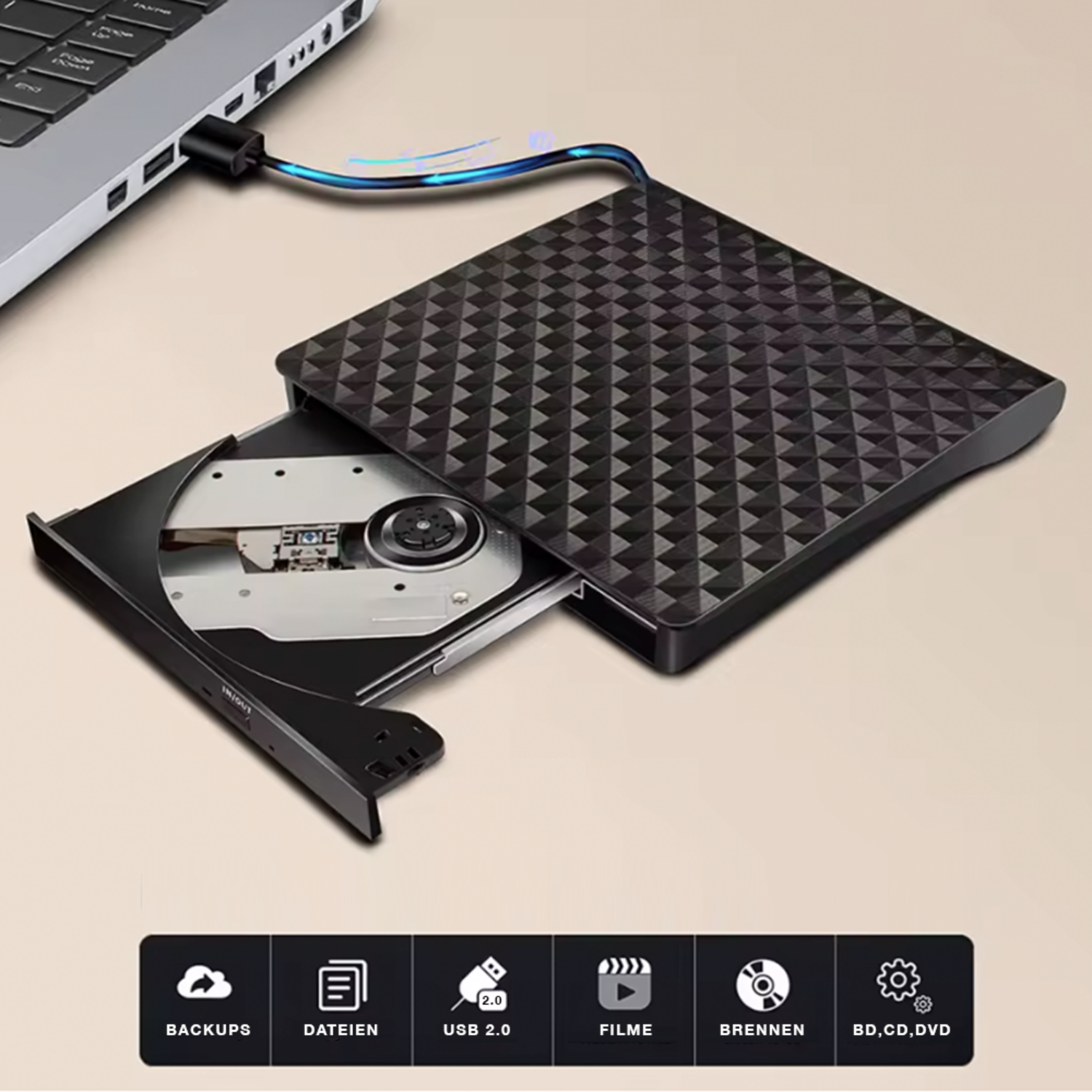 Masterizzatore DVD USB esterno nero collegato a un laptop.