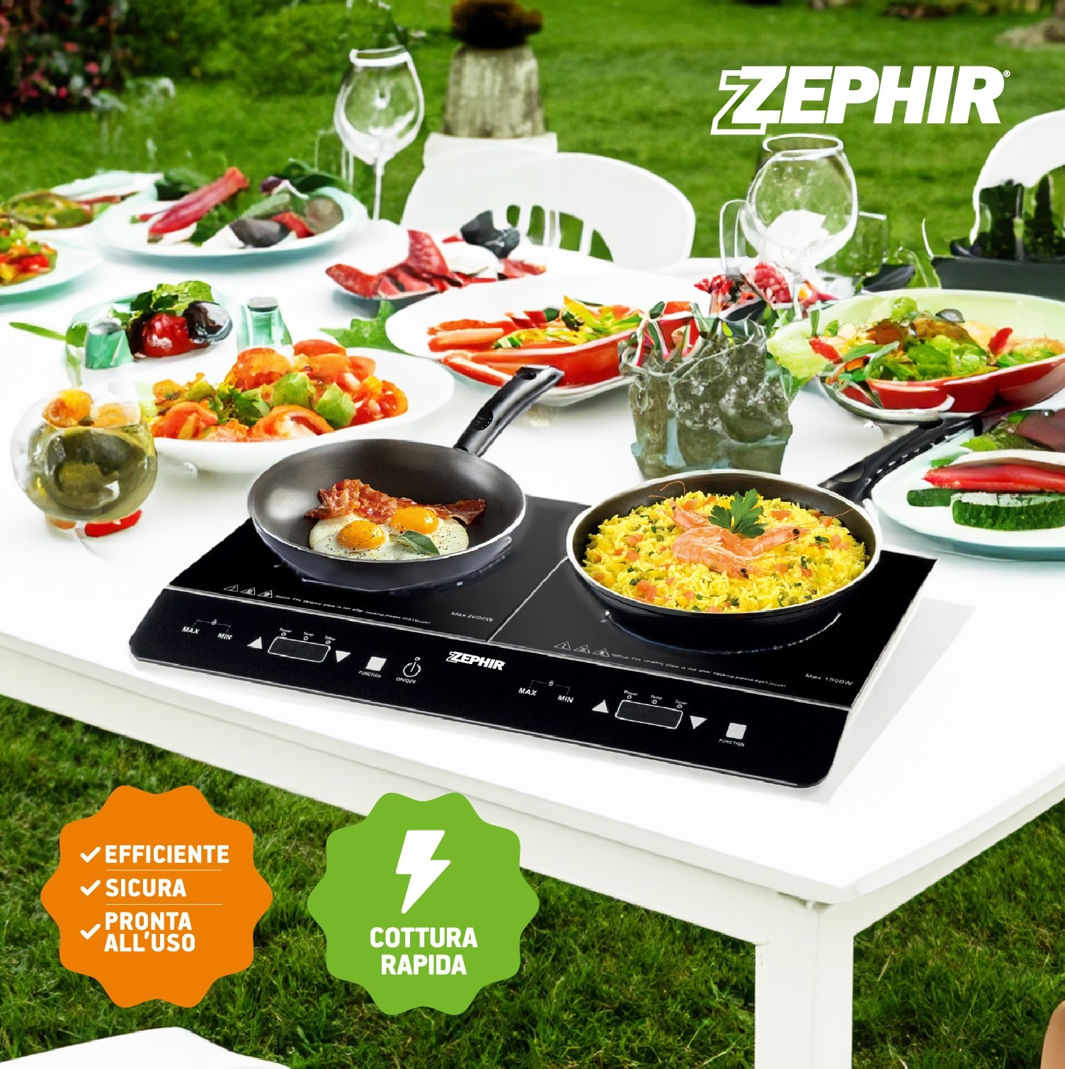 Stół ogrodowy z jedzeniem, płyta indukcyjna z patelniami i logo Zephir.