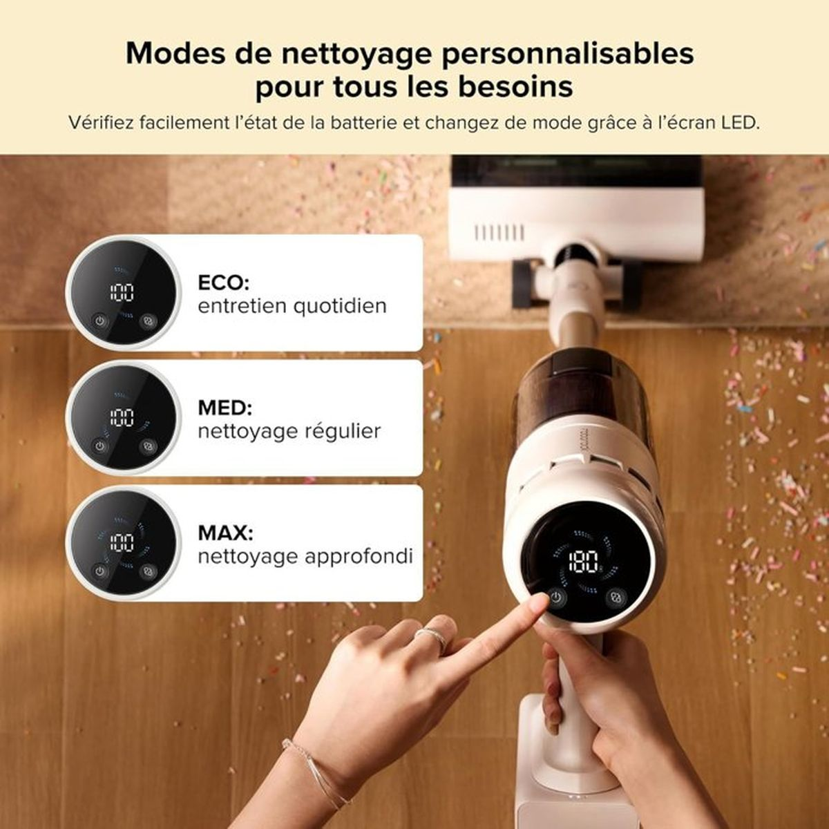 Una aspiradora de mano con pantalla LED muestra modos de limpieza: ECO, MED, MAX.