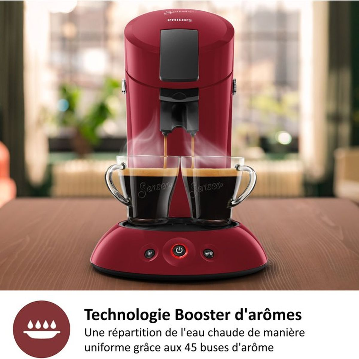 Eine rote Philips Senseo-Kaffeemaschine brüht zwei Tassen Kaffee.