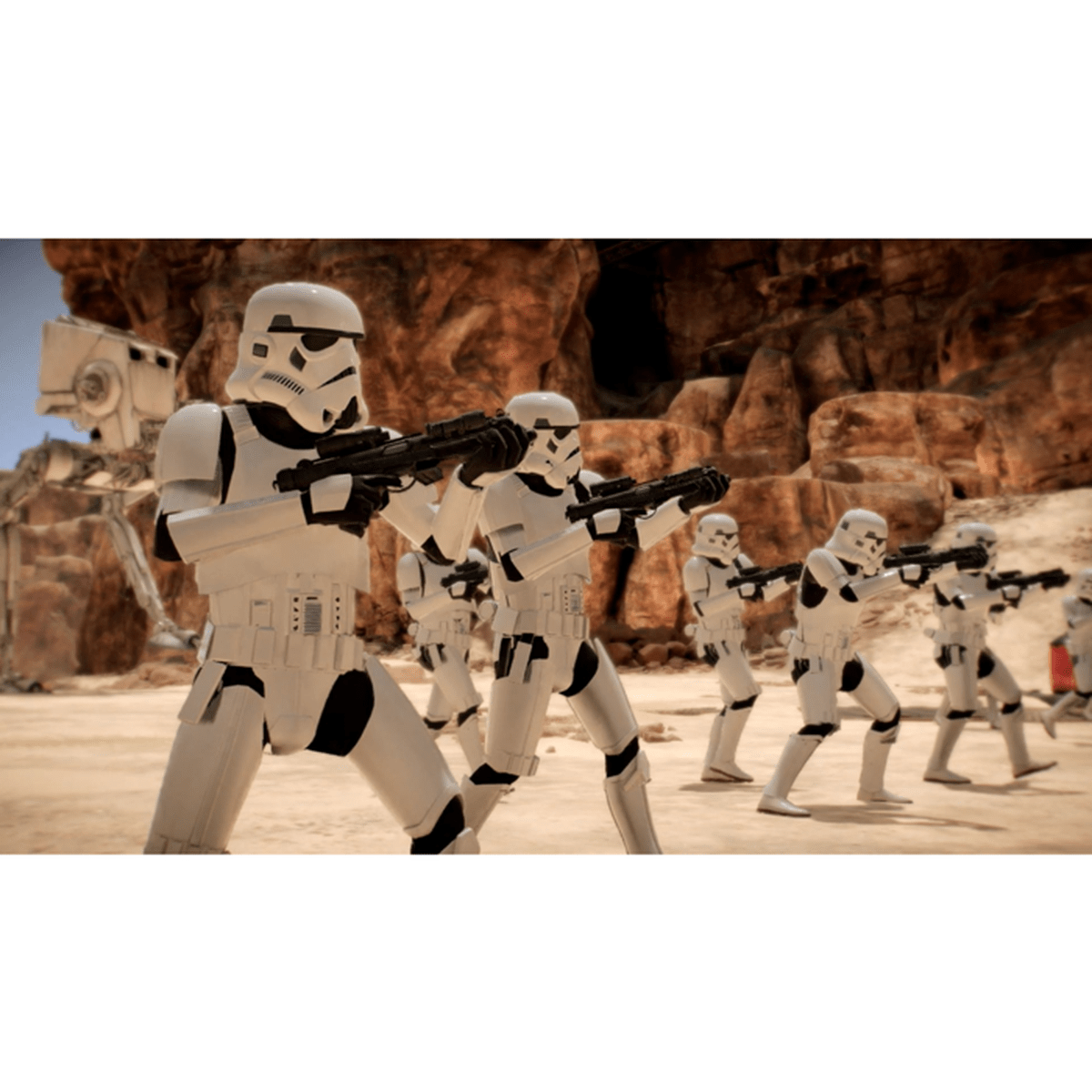 Stormtrooper con blaster su pianeta sabbioso con formazioni rocciose.
