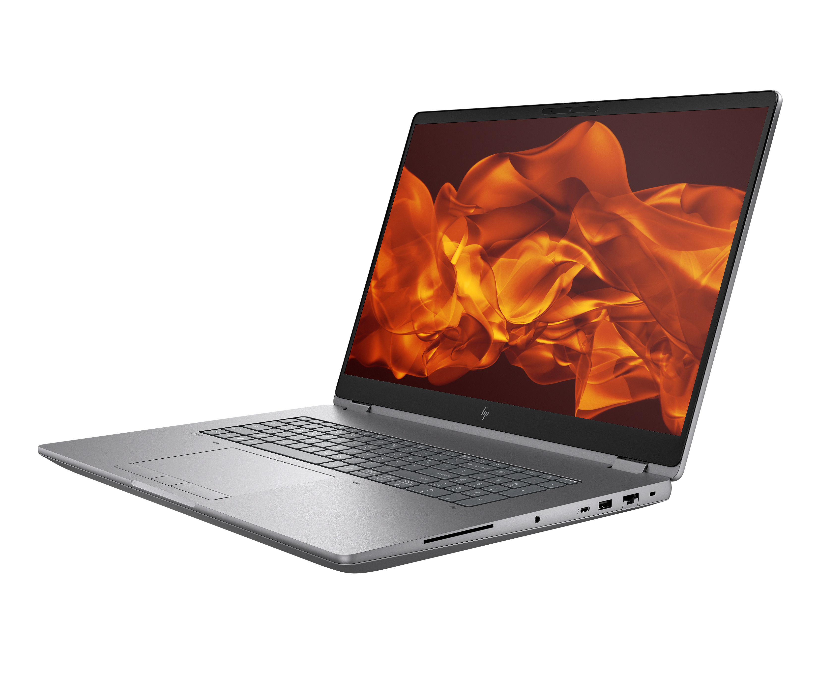 A silver laptop displaying an orange, flame-like wallpaper.