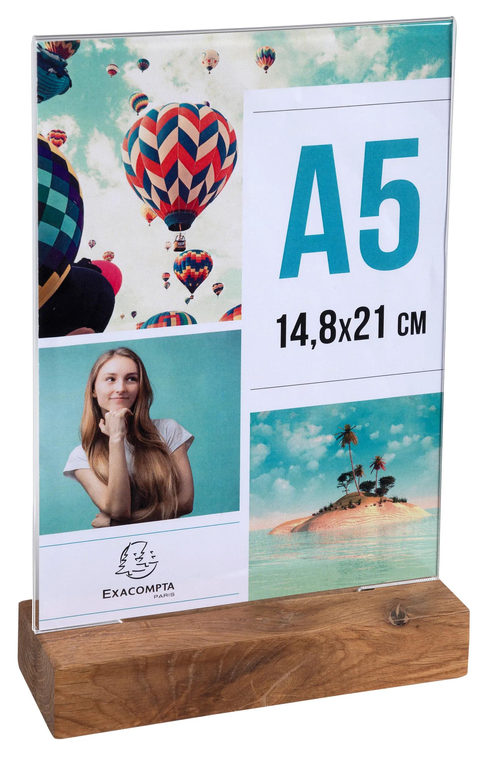 Pantalla tamaño A5 con globos aerostáticos, mujer e imagen de isla en base madera.