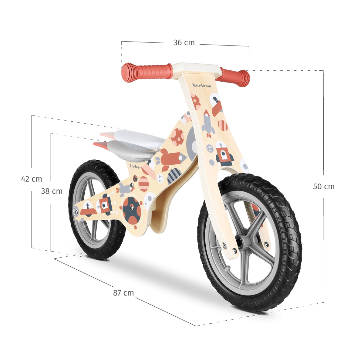 Una bicicleta de equilibrio de madera temática espacial, 87cm de largo, 50cm de alto.