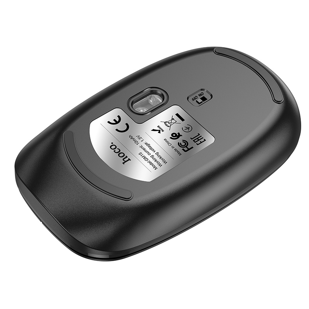 Parte inferior de un ratón Hoco negro que muestra el modelo GM15, logotipos CE, FCC, EAC y interruptor ON/OFF.