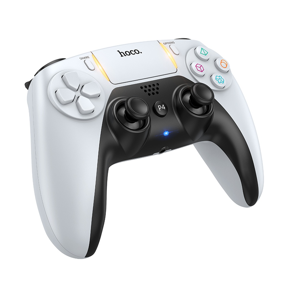 Un controlador Hoco blanco y negro con joysticks y botones.