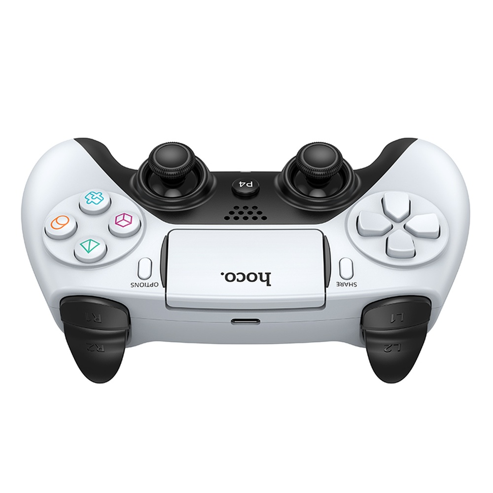 Un mando de juegos blanco y negro con joysticks y botones sobre fondo blanco.