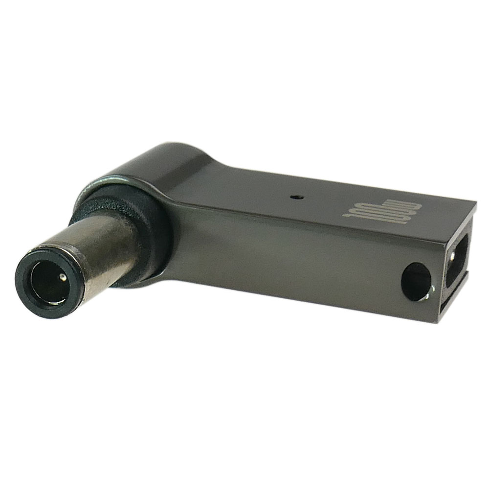 Szary adapter pod kątem 90 stopni z okrągłą wtyczką i prostokątnym portem.