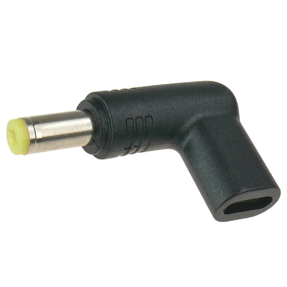 Czarna wtyczka kątowa z srebrnym bolcem i żółtą końcówką.