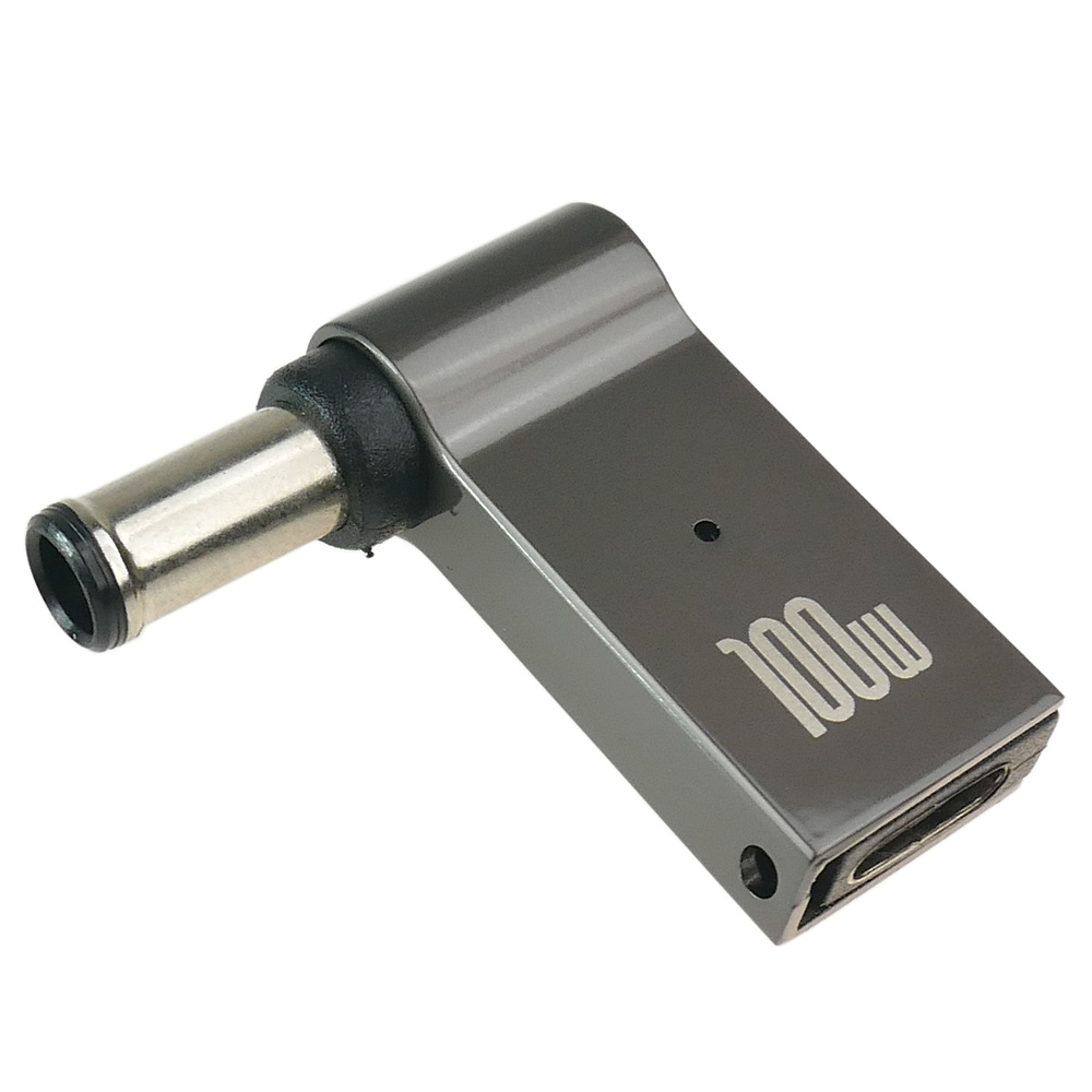 Szary adapter USB-C 100W z okrągłą wtyczką i kątową obudową.