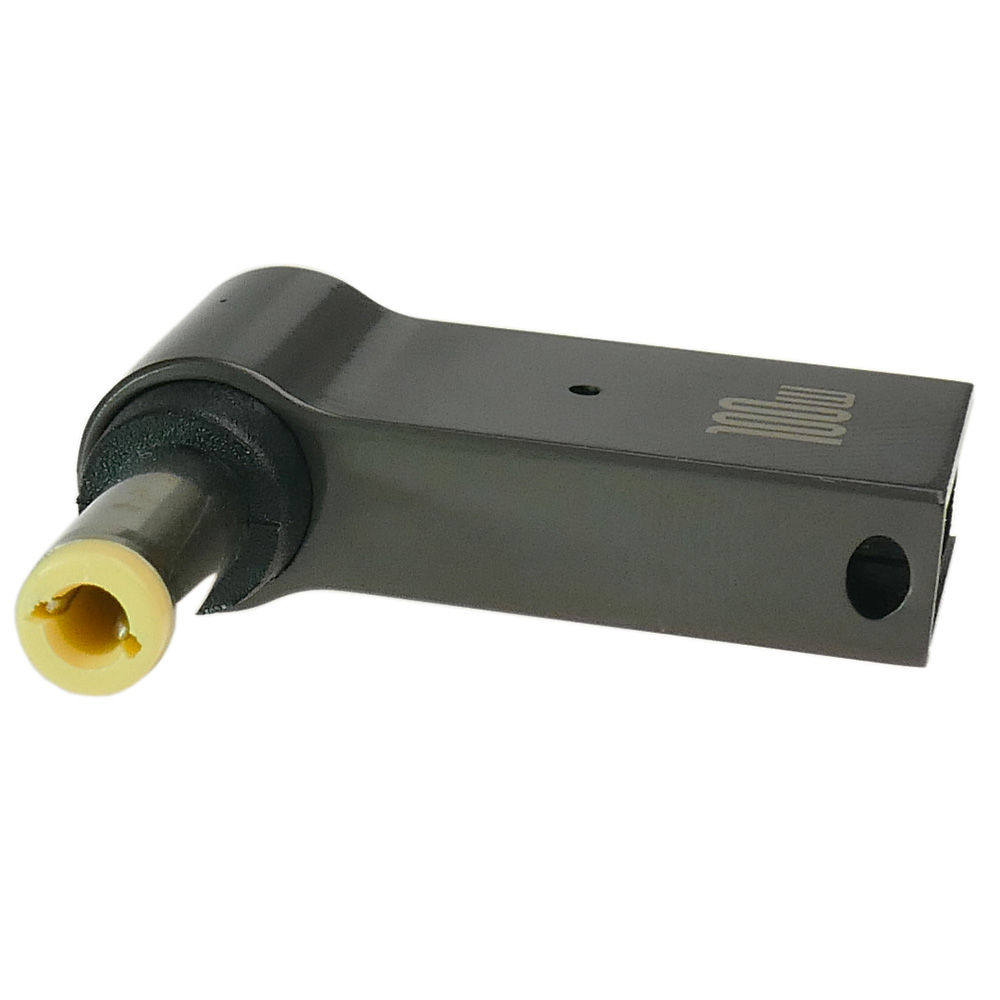 Ciemny metalowy element z żółtą wstawką i wygrawerowanym logo.