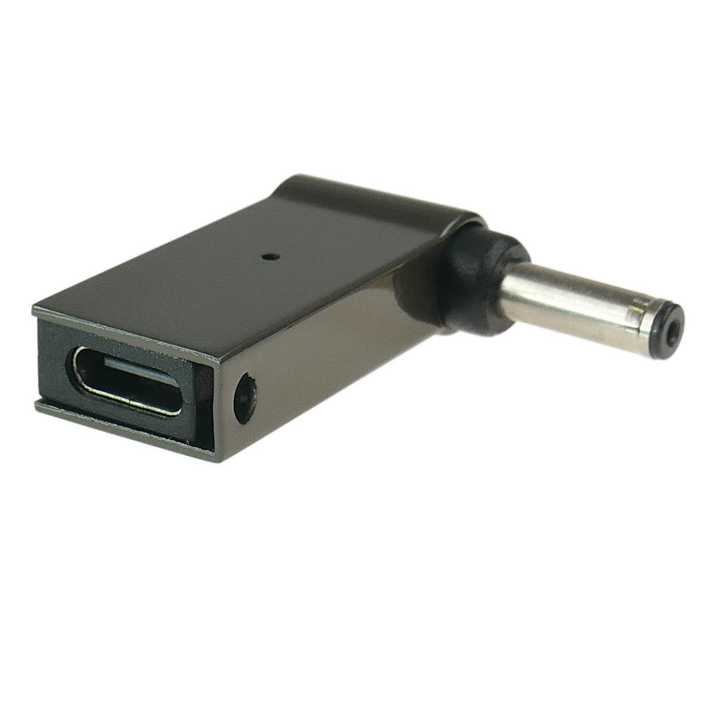 Czarny adapter USB-C z okrągłą metalową wtyczką.