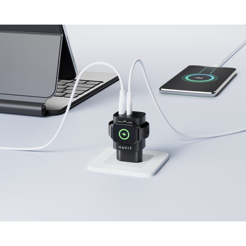 Czarna ładowarka USB z dwoma kablami ładująca tablet i smartfon.