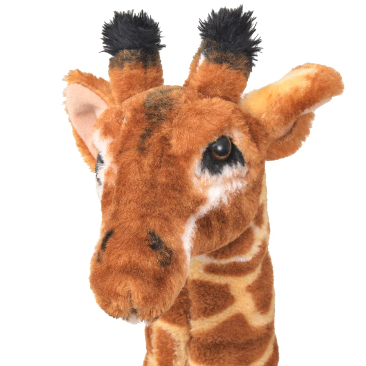 Ein braunes Plüschgiraffengesicht mit schwarzen Flecken und weißen Akzenten.