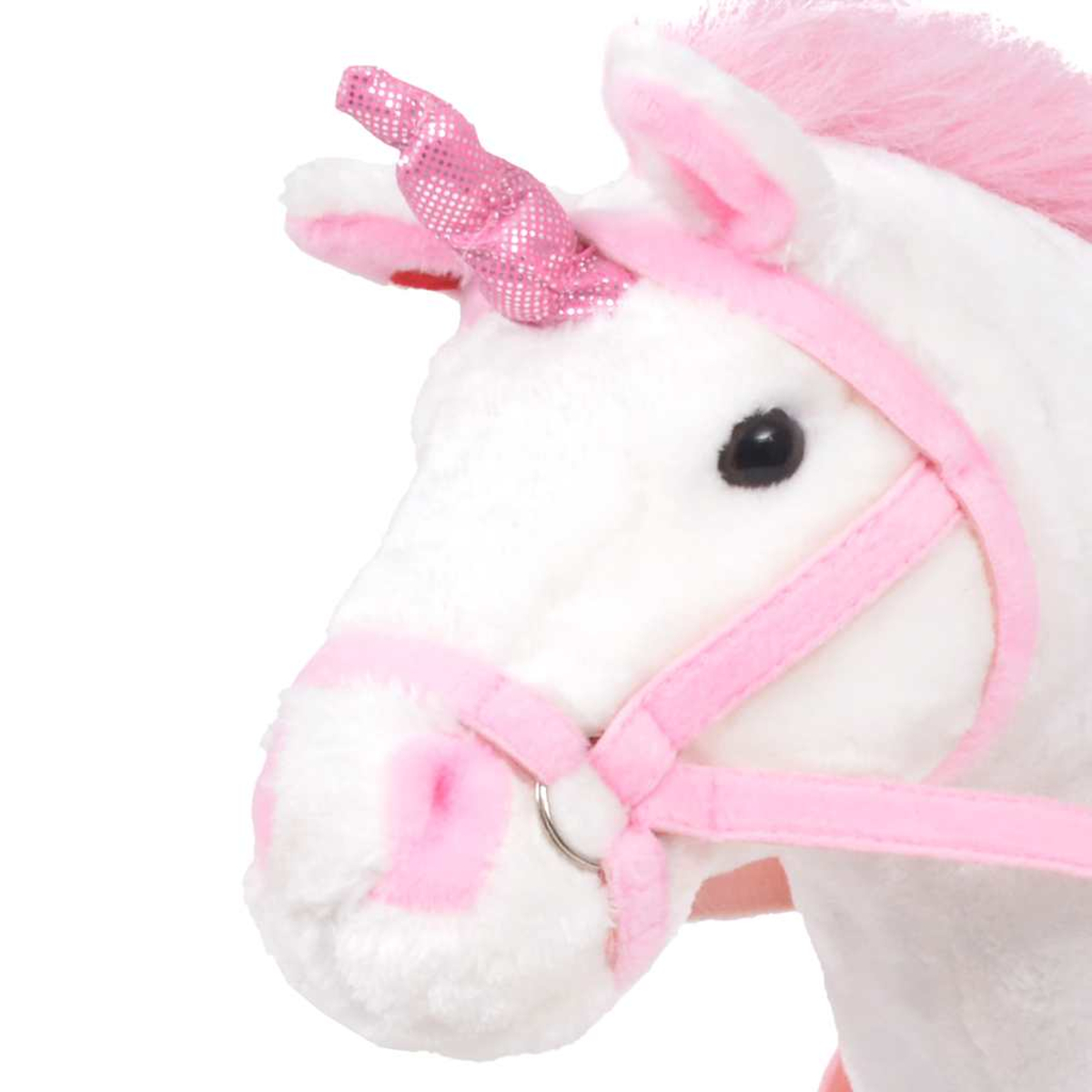 Ein weißes Plüsch-Einhorn mit pinker Mähne, Horn und Geschirr.