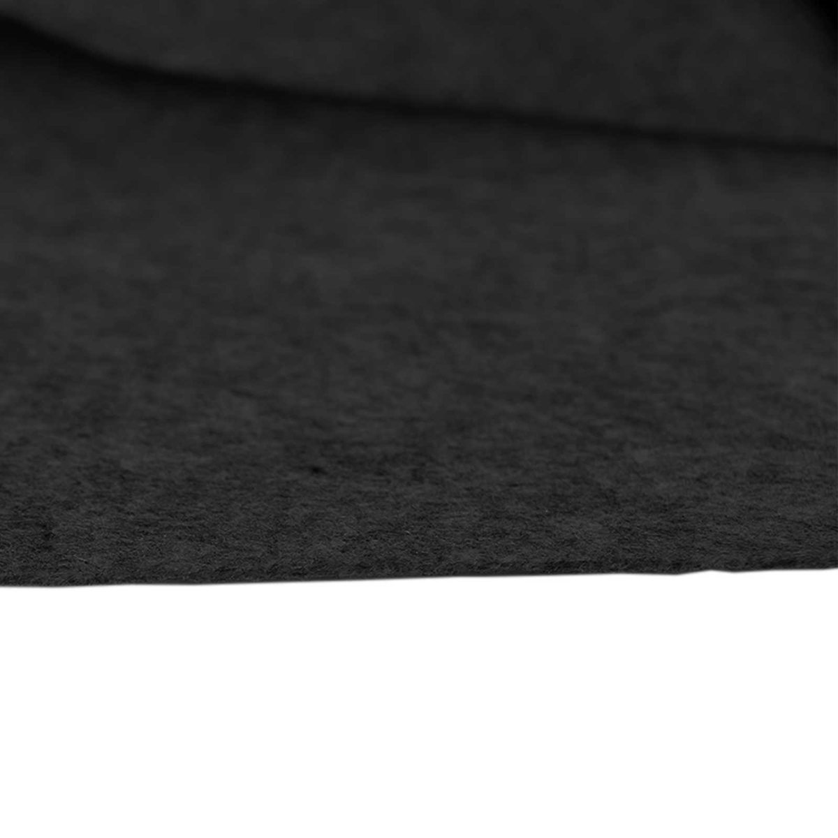Nahaufnahme einer schwarzen Textur mit unscharfem Hintergrund und weißem Boden.