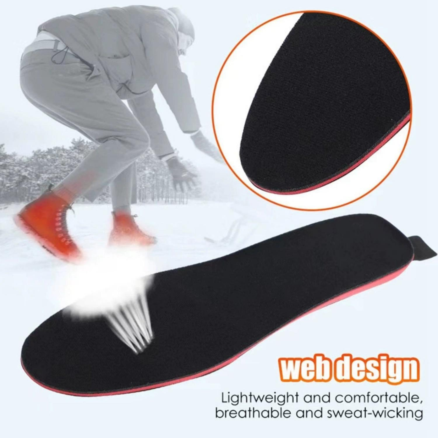 Ein Mann in orange Stiefeln im Schnee, mit einer Einlegesohle.