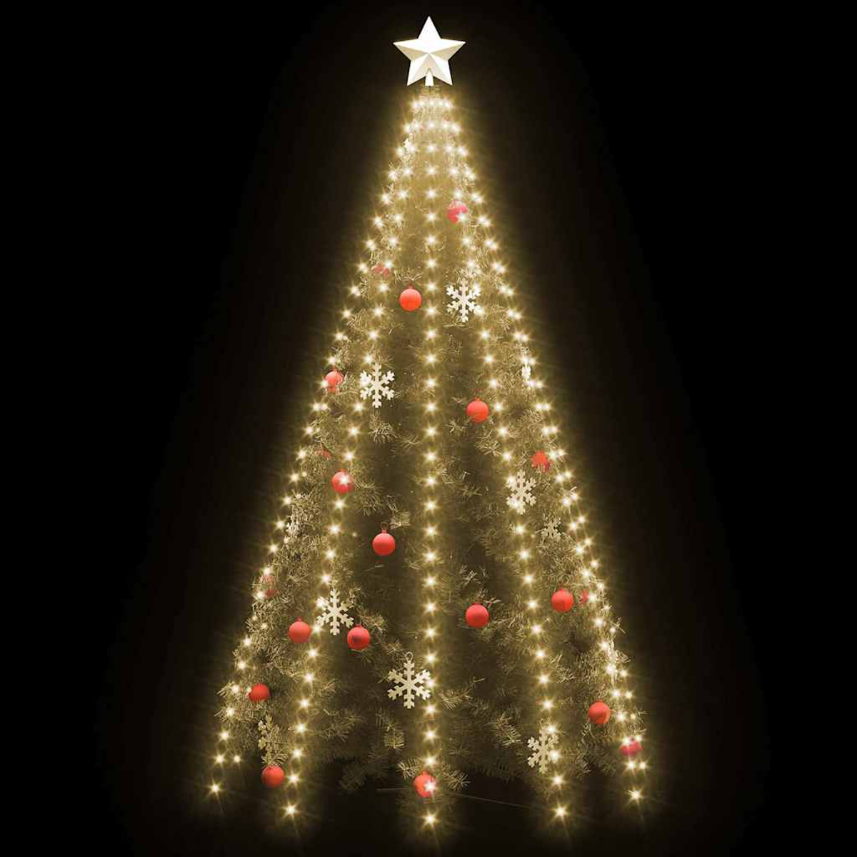 Ein beleuchteter Weihnachtsbaum mit Stern, roten Kugeln und Schneeflocken auf schwarzem Grund.