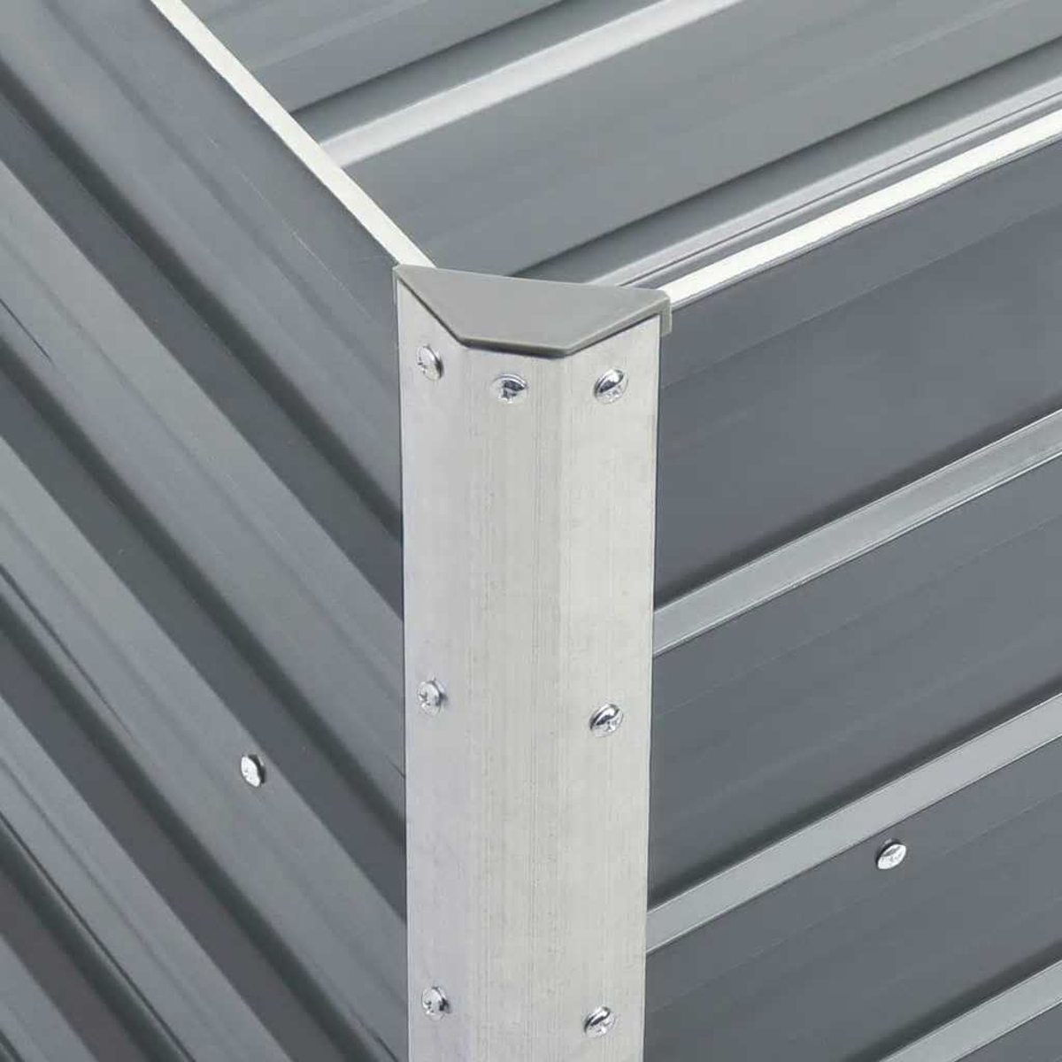 Graue Metallpaneele mit silberner Ecke und Schrauben.