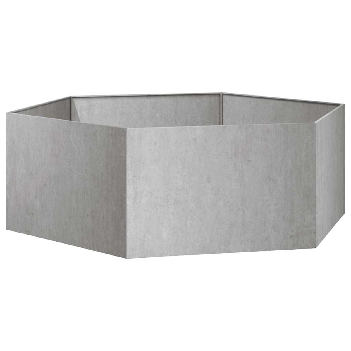 Ein sechseckiger Hochbeet-Rahmen aus grauem Betonimitat.
