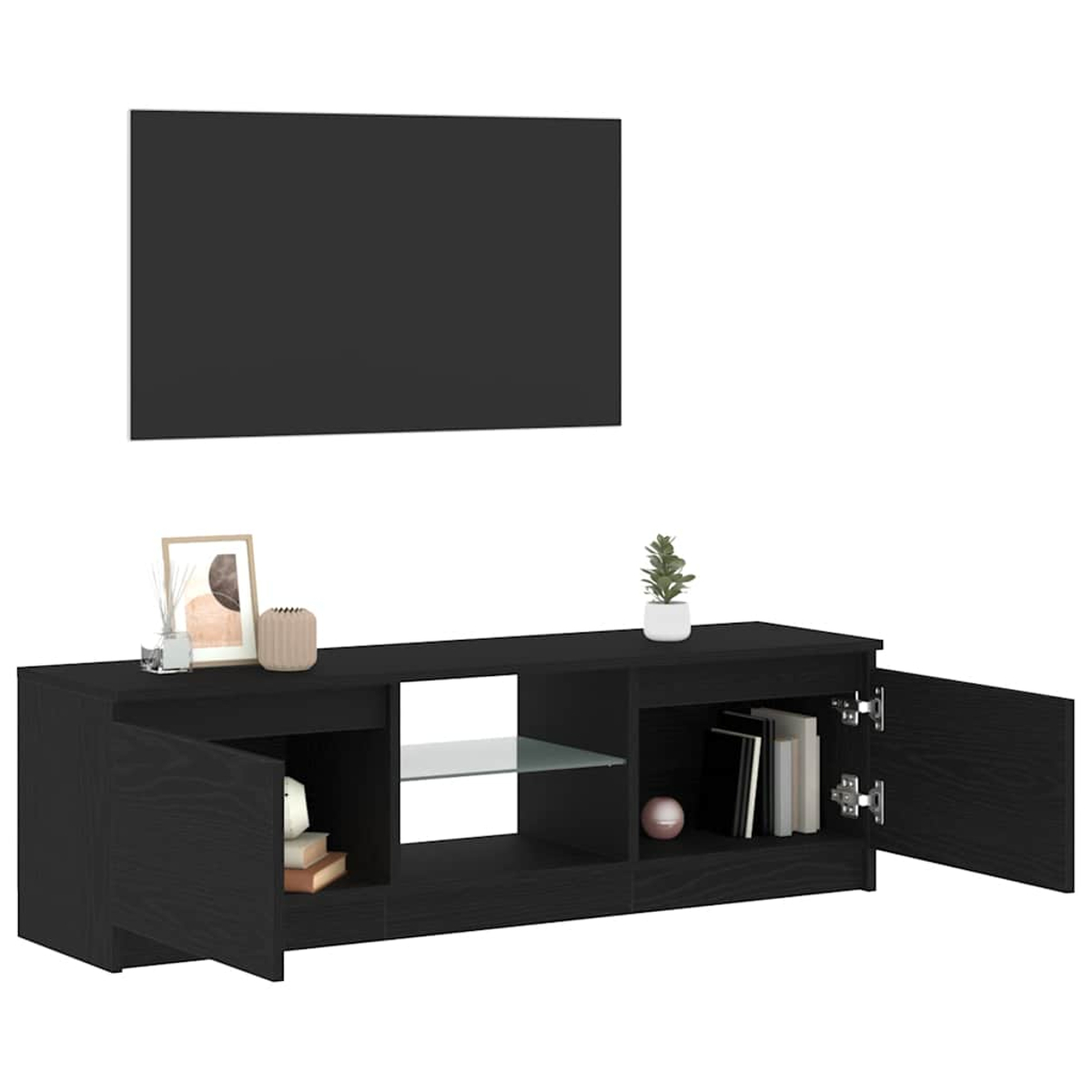 Ein schwarzes TV-Möbel mit offenen Türen, Büchern und Dekoration.