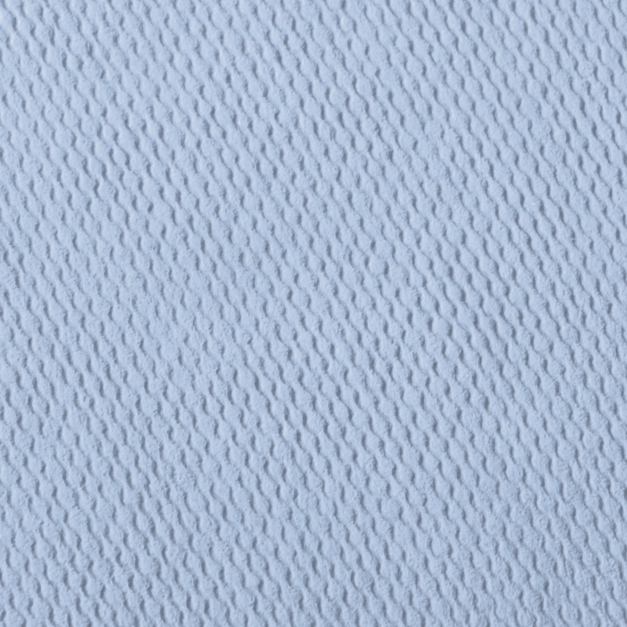 Jasnoniebieska, teksturowana powierzchnia z ukośnym wzorem fal.