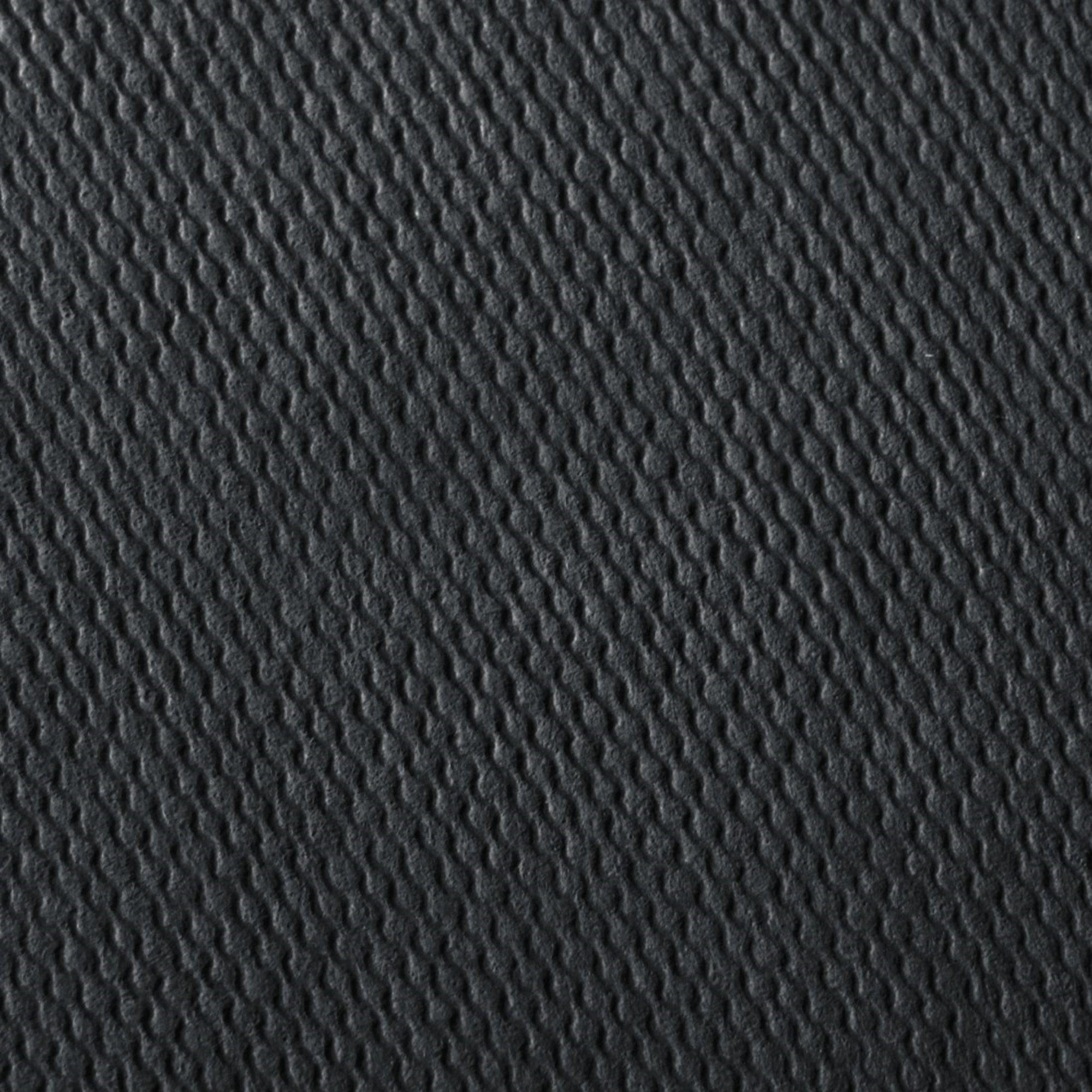 Abstrakcyjna tekstura z ciemnym, falistym wzorem i cieniami.