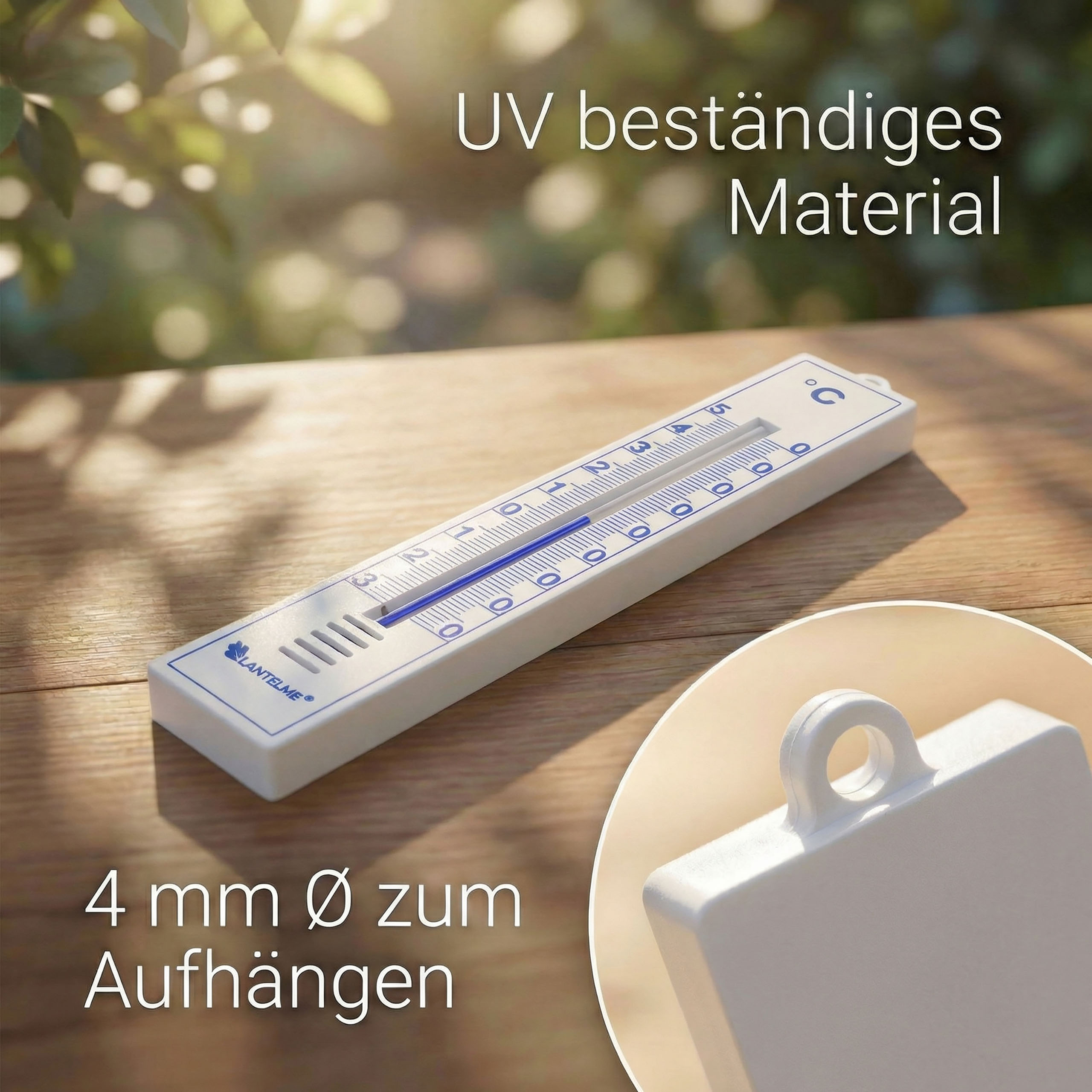 Ein Thermometer auf einem Holztisch mit Text über UV-beständiges Material.