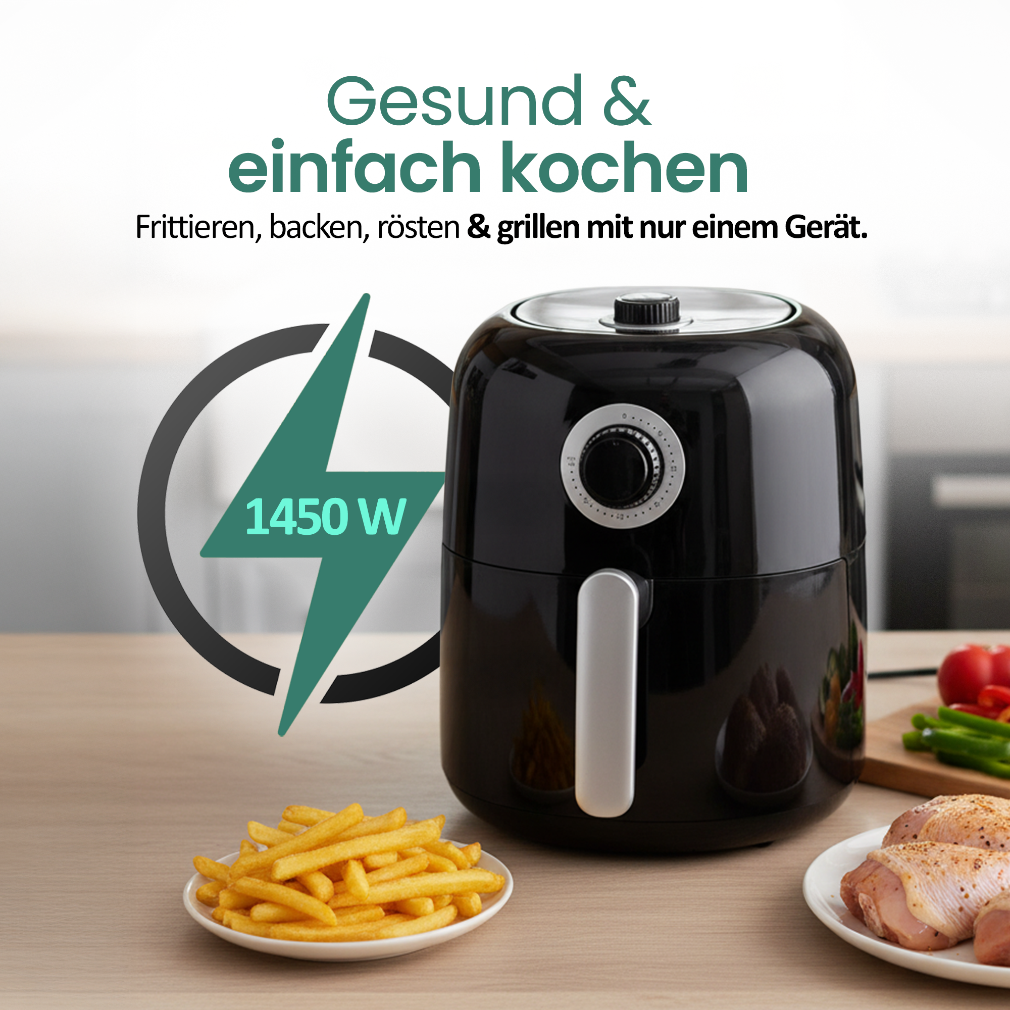 Schwarzer Heißluftfritteuse mit Pommes, Hähnchen und Gemüse auf dem Tisch.