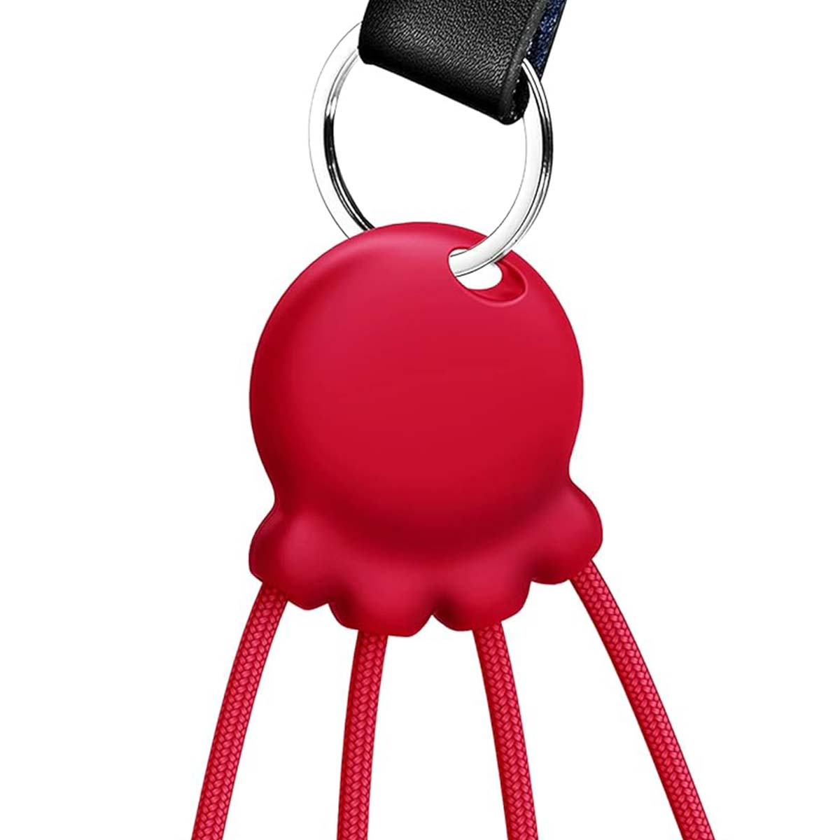 Pendentif rouge en forme de cœur avec des cordons attachés à un porte-clés.