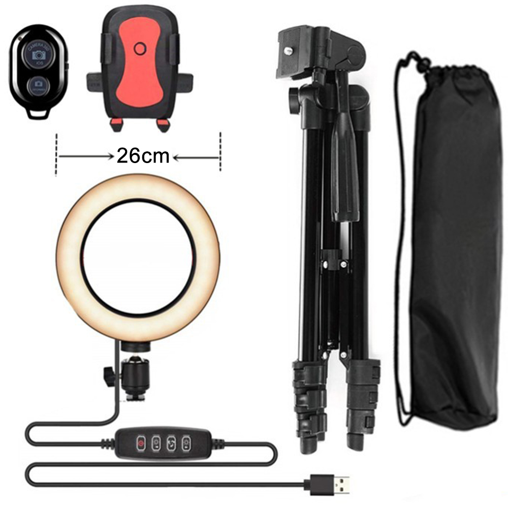 Un ring light con telecomando, supporto telefono, treppiede e borsa.
