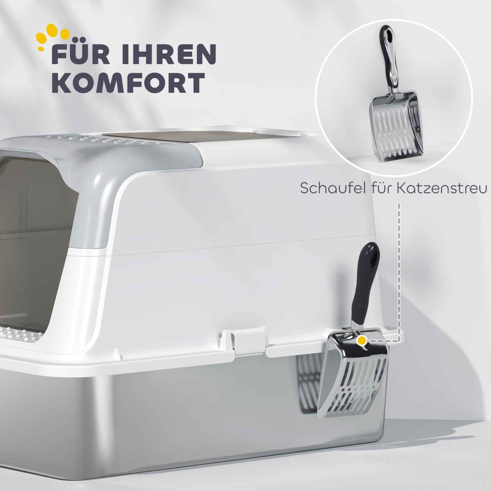 Eine weiße und graue Katzentoilette mit einer Schaufel, die an der Seite hängt.