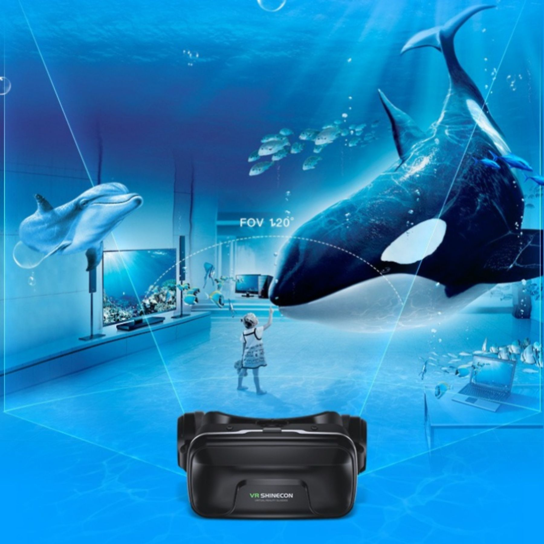Ein Mädchen in VR-Brille blickt auf einen Orca, Delfin und Fische in einer Unterwasserwelt.